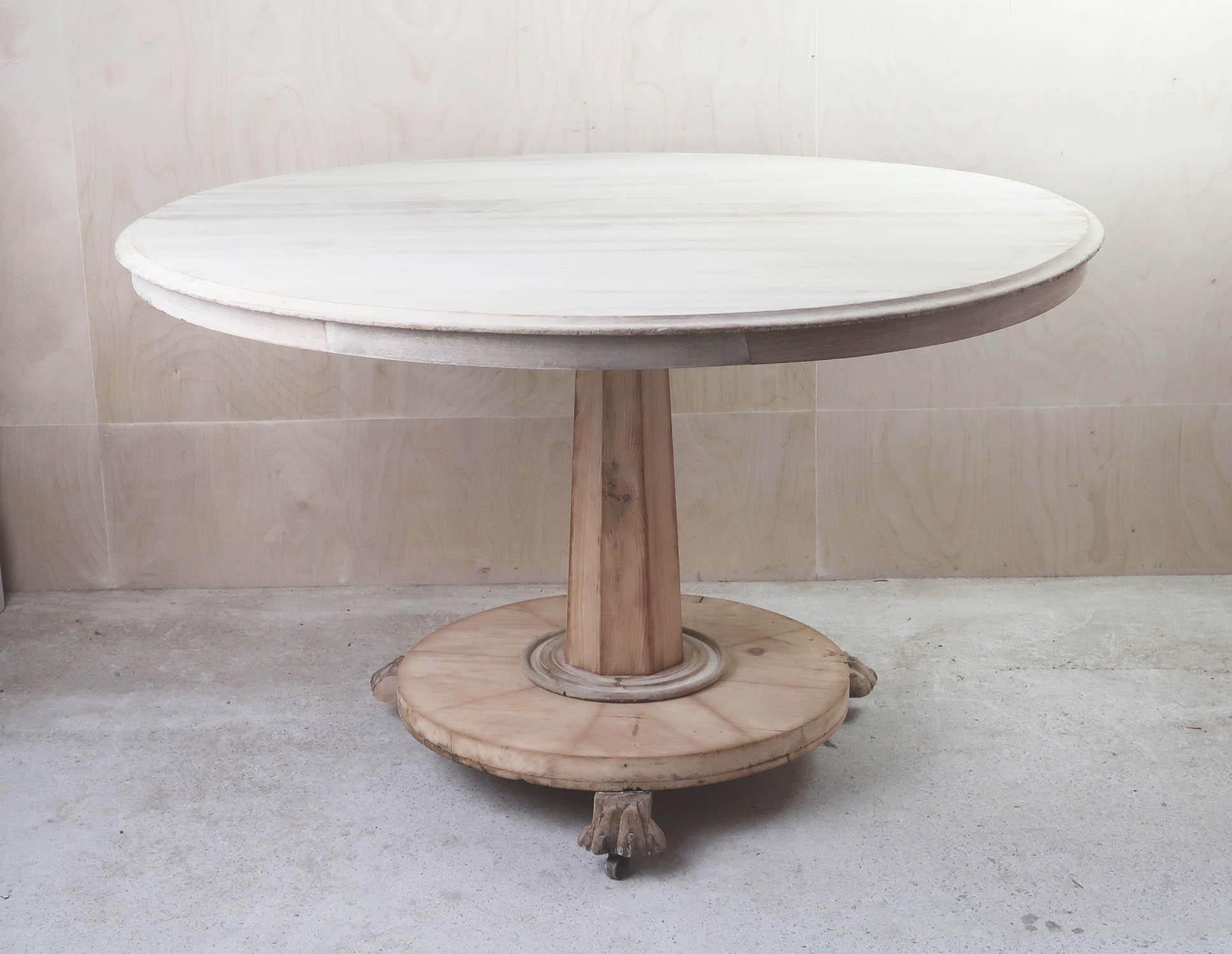 Fabulous round table. Made from bleached tropical hardwood and pine

With lions paw feet on castors

I particularly like its simplicity.

I have chosen not to lacquer or wax the table.

Sturdy construction

For more economical overseas shipping we