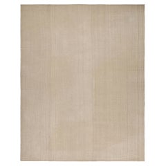 Antiker getäfelter persischer Kilim und einfarbiger Teppich mit beigefarbenen Streifen