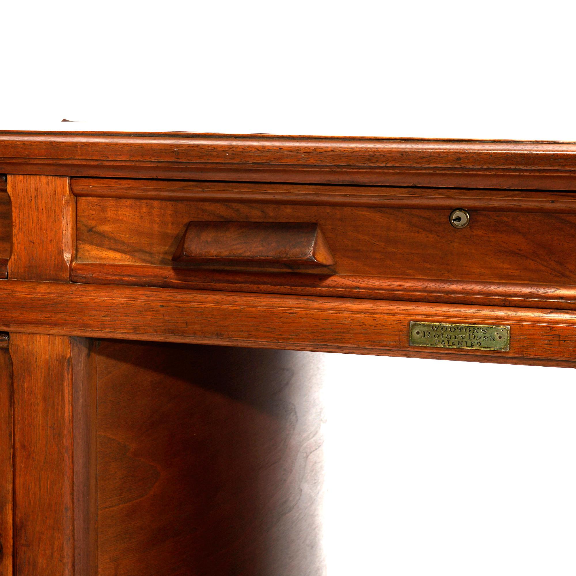 Antique Paneled Walnut Rotary Library Desk by Wooton, Indianapolis, Circa 1890 2