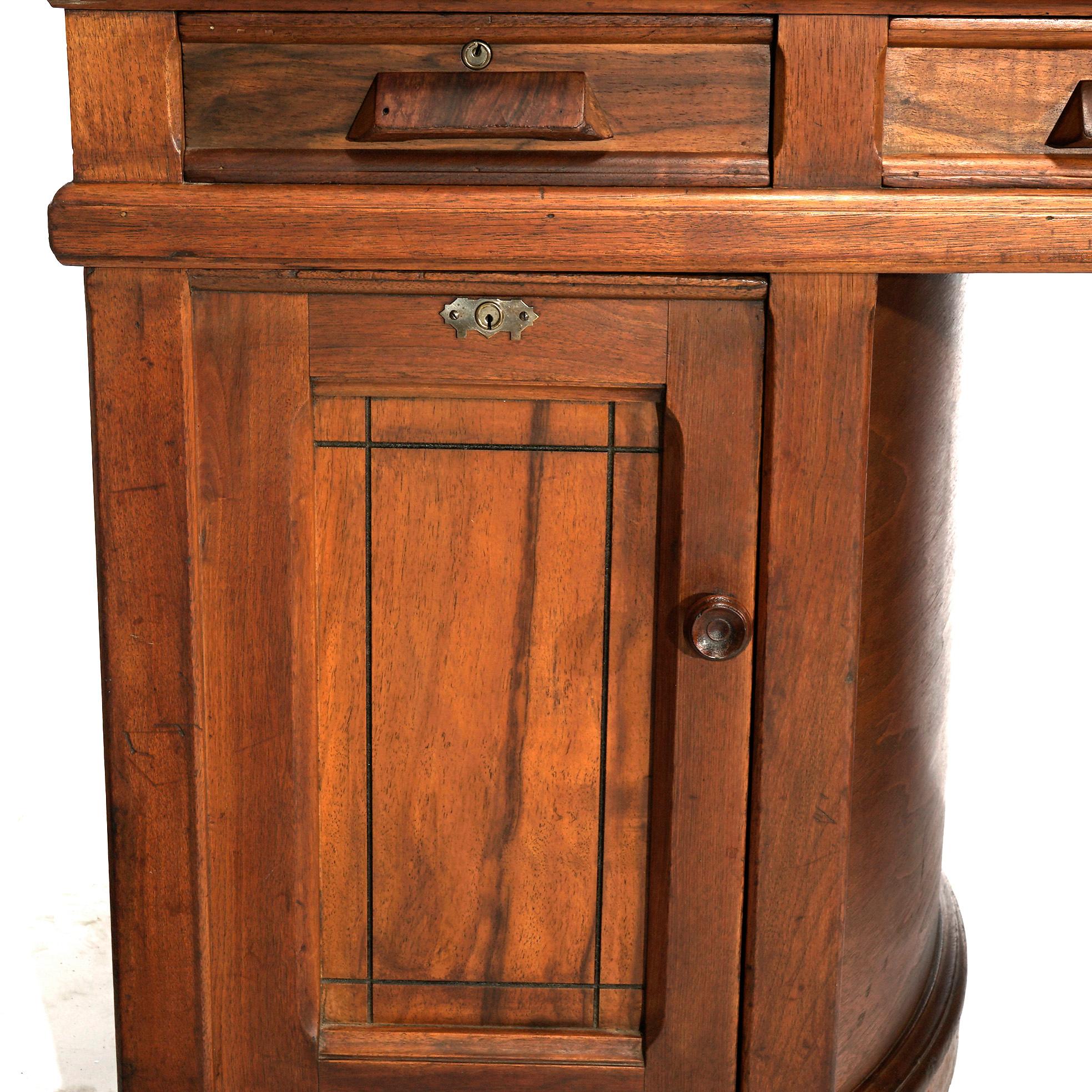 Antique Paneled Walnut Rotary Library Desk by Wooton, Indianapolis, Circa 1890 4