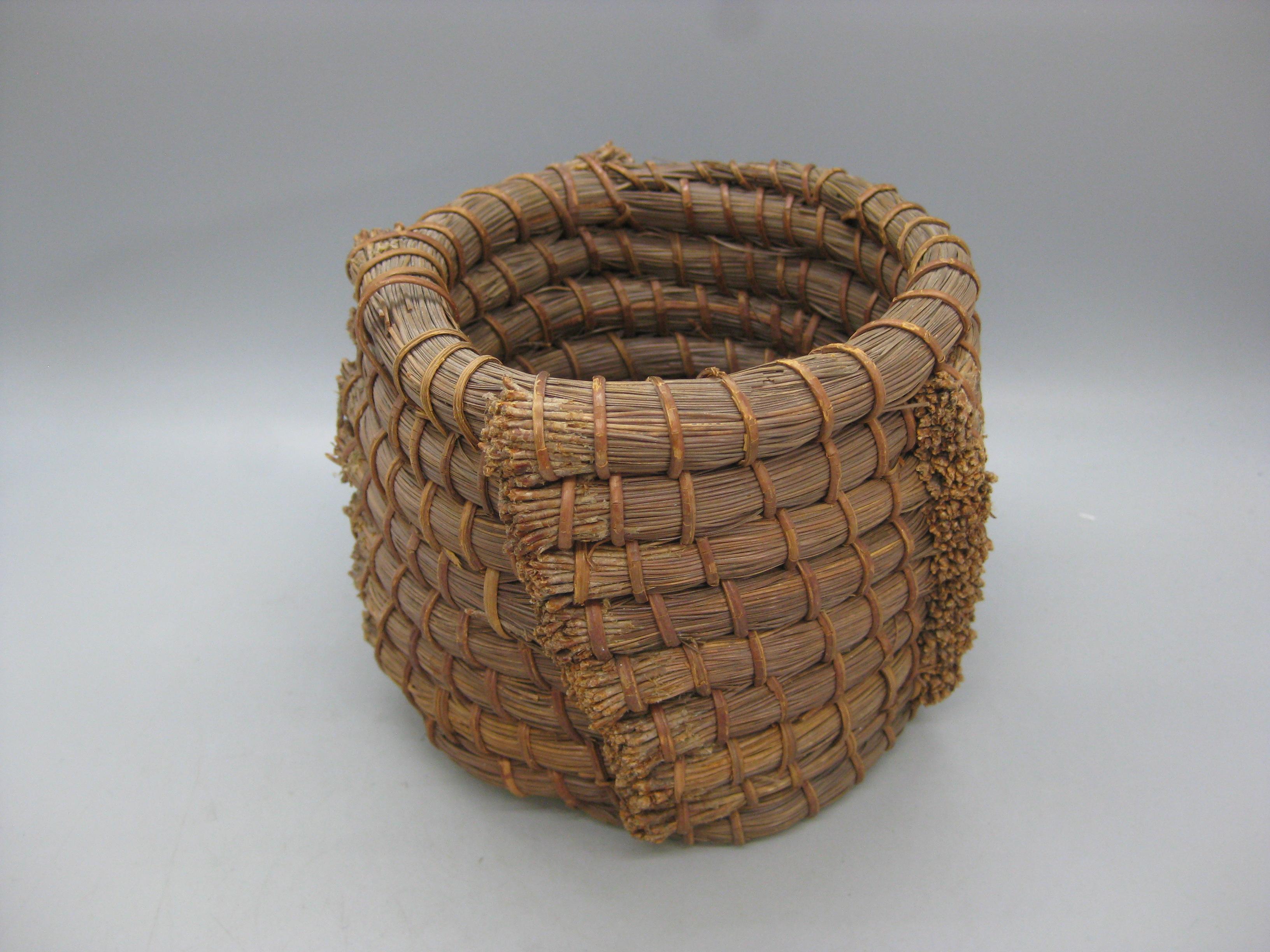 Wonderful antique hand made Papago Native American Indian pine needle coil basket. Great form and design. In excellent original condition. Tightly woven and color is great. Measures: 3 3/4