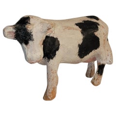 Mucca antica in cartapesta