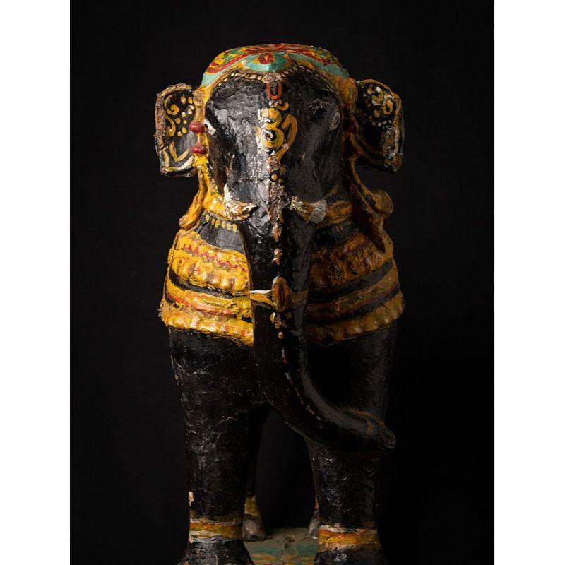 Material: Papier mâché
Material: wood
54,5 cm high 
22 cm wide and 56,2 deep
Weight: 6.792 kgs
Originating from India
19th Century.

