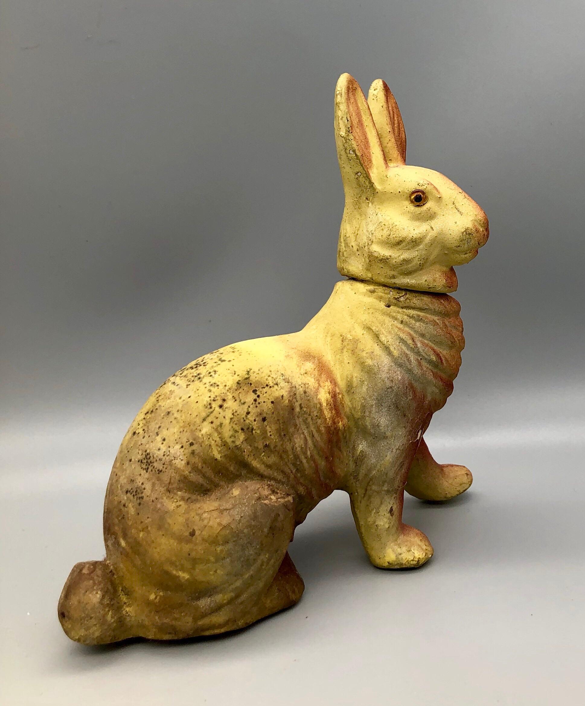 This handsome papier-mâché rabbit dates from the 1890s. Nice coloring, some light foxing on back. Removable head and glass eyes. Paint crackling on front leg with small chip, but overall Fine condition.

Germany
Papier-mâché
circa 1890