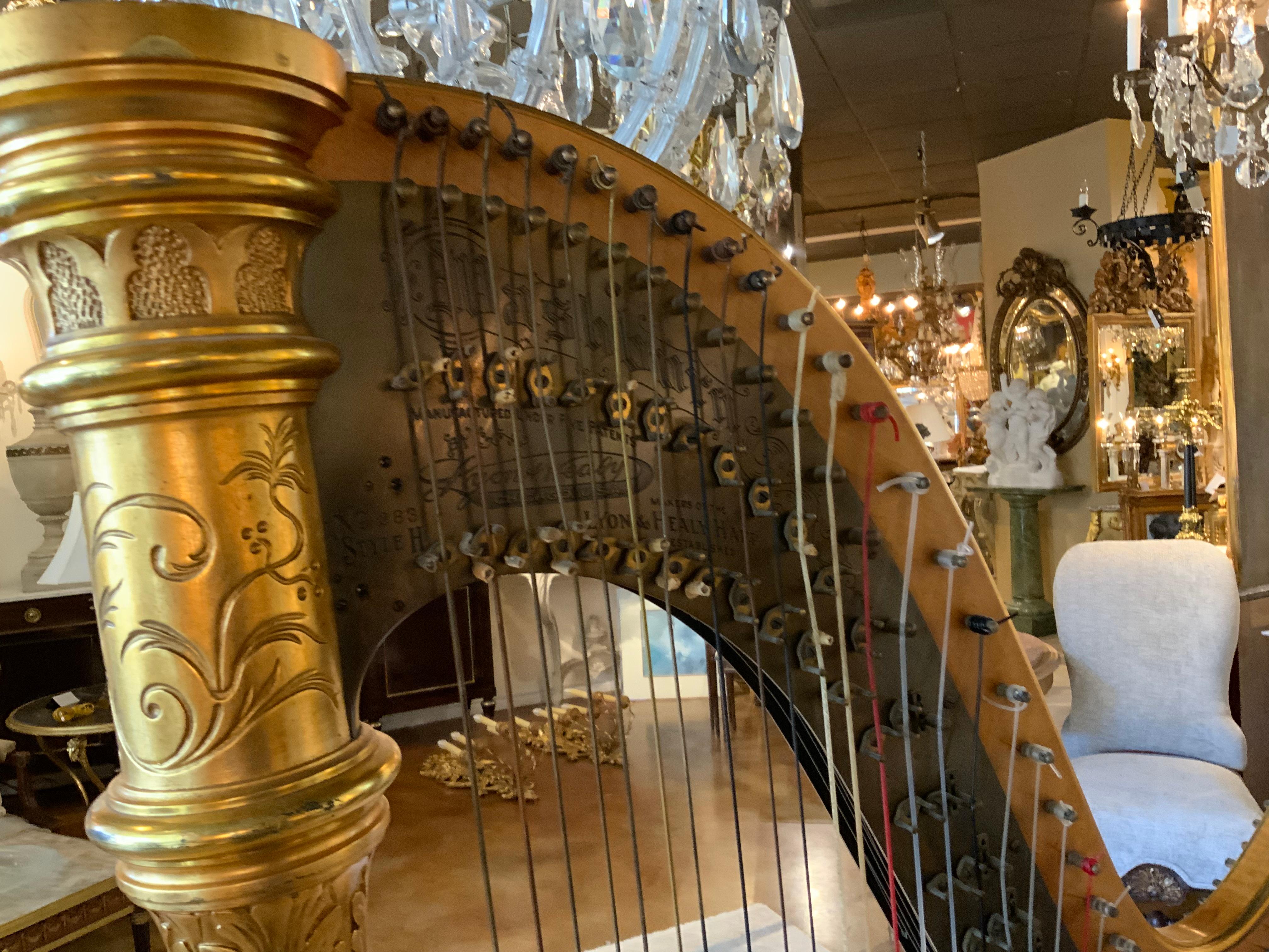 Antique parcel gilt musical harp by Lyon and Healy 7