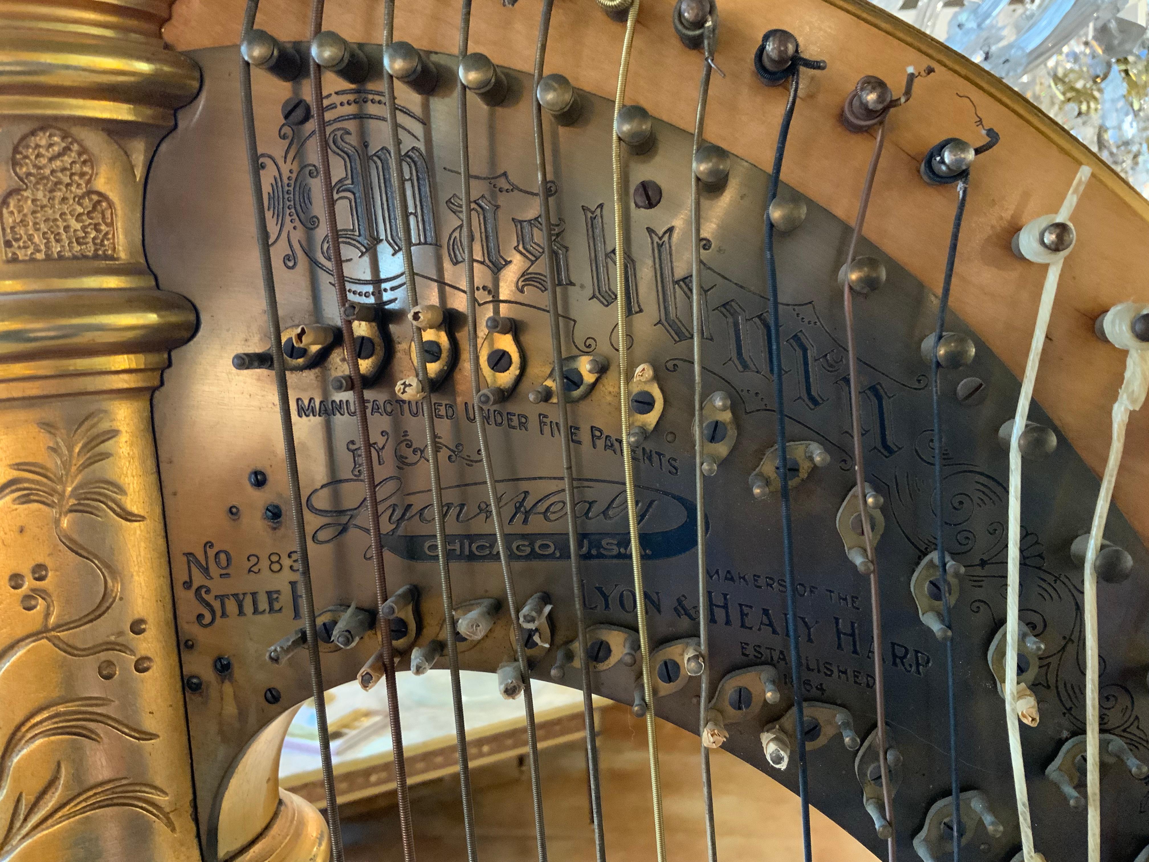 Antique parcel gilt musical harp by Lyon and Healy 8