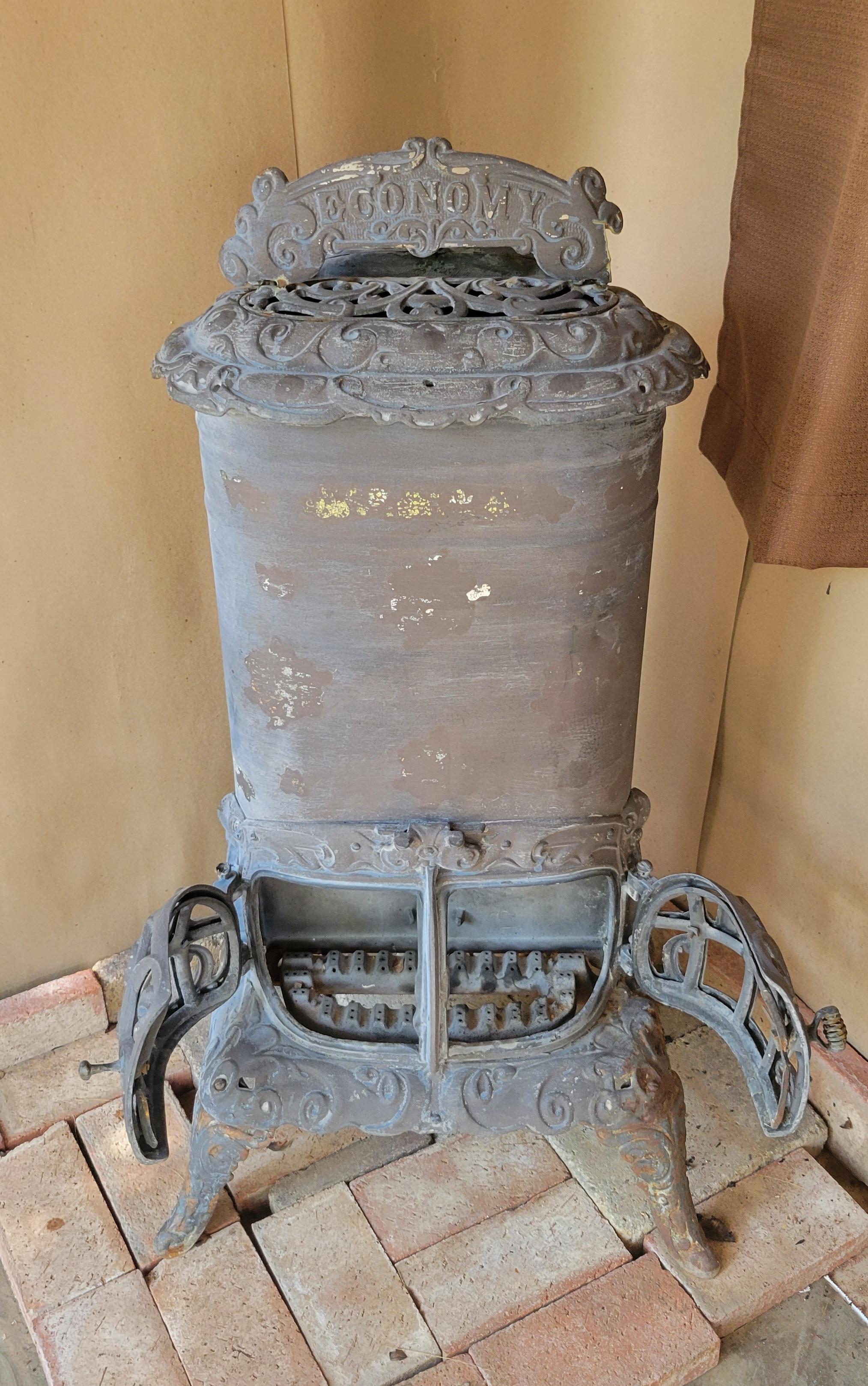 Iron Antique Parlor Gas Stove - Heater by Economy Stove & Mfg Co., Michigan