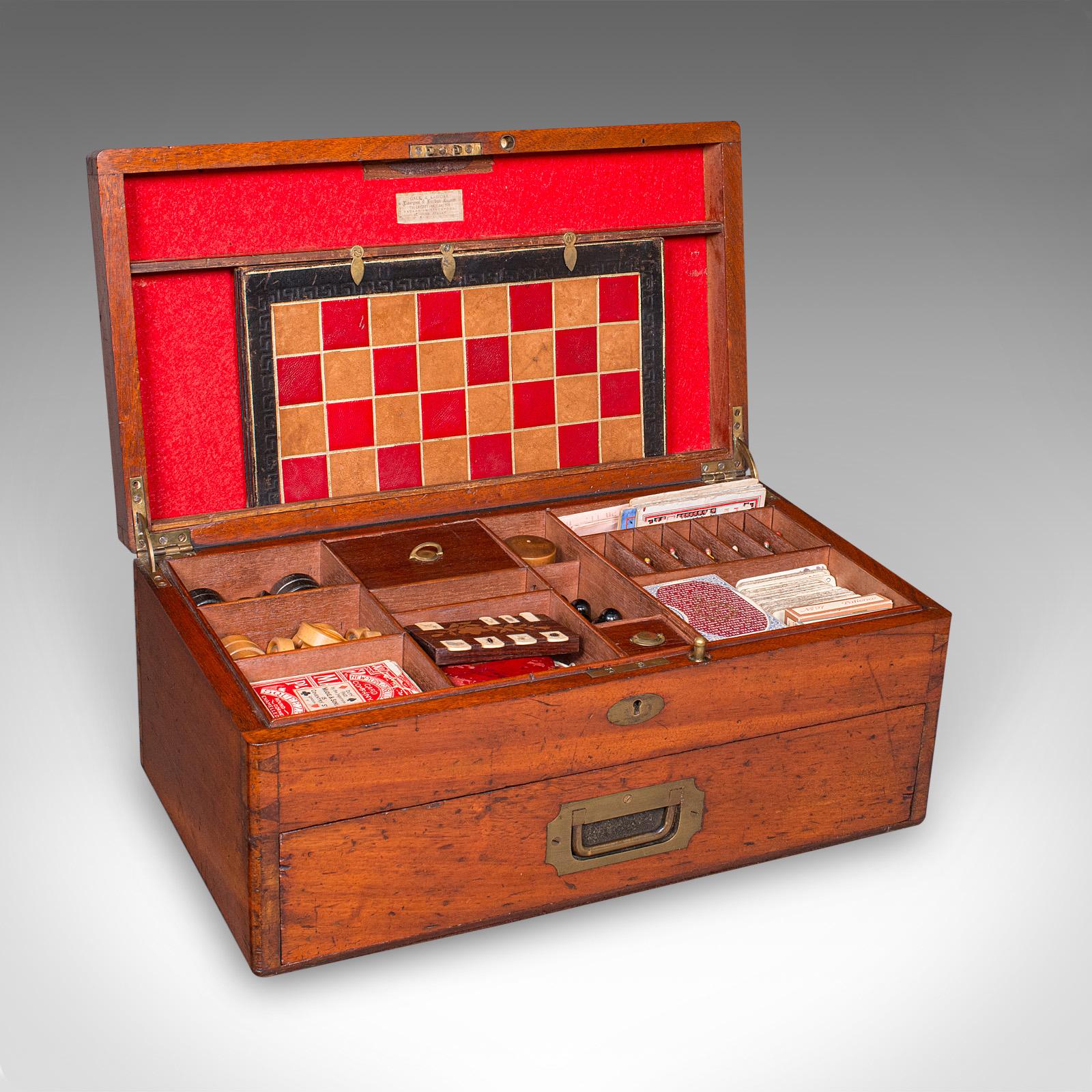 This is an antique games compendium. An English, mahogany gaming case by Gale & Lawday, dating to the Victorian period, circa 1880. A superb and comprehensive set, this compendium offers a wealth of classic games within an elegant and comprehensive