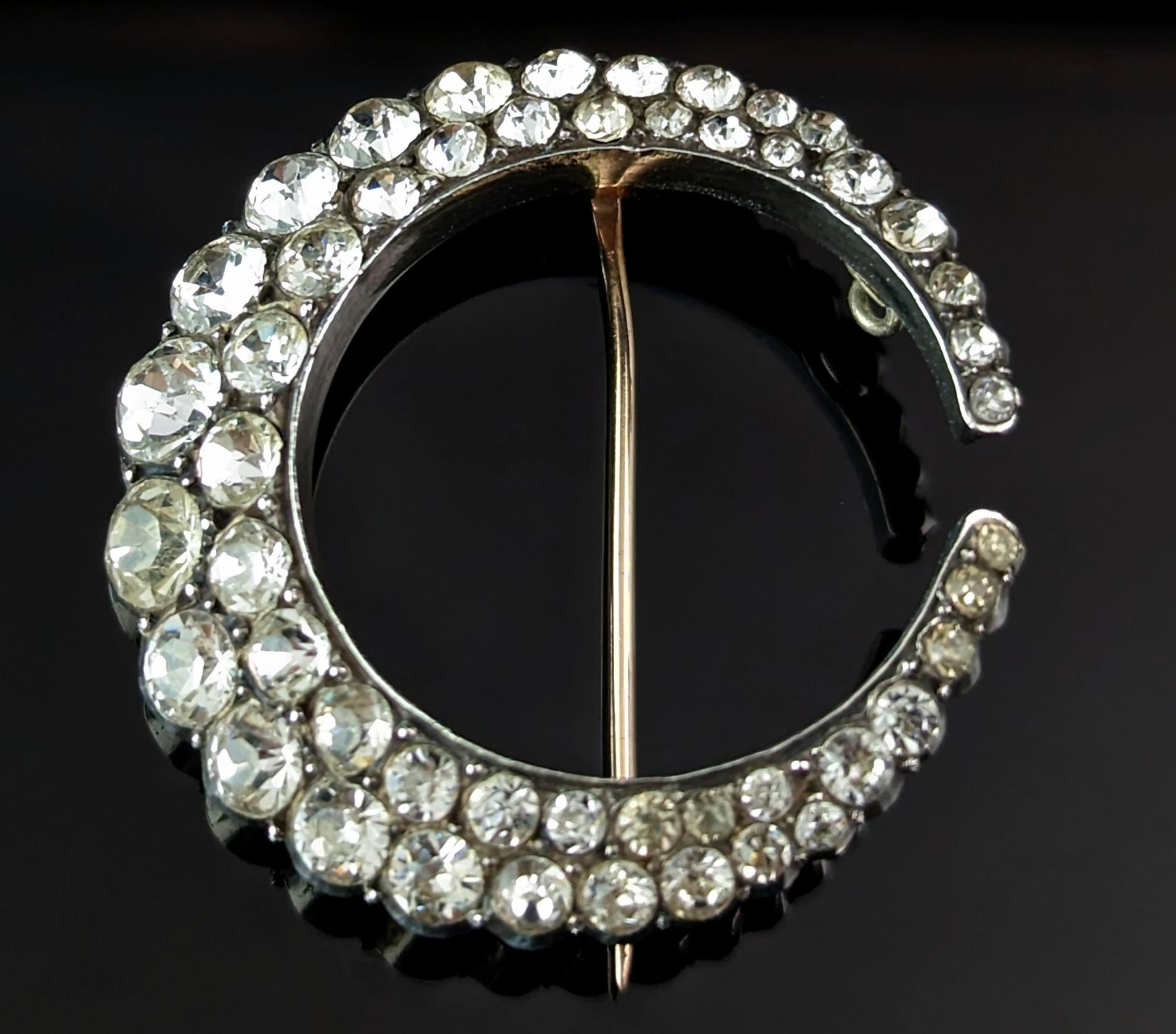 If you are a lover of celestial jewellery then you won't be able to resist this exceptional early Victorian, silver and 9ct gold paste crescent brooch.

A beautiful chunky curved moon set with pretty sparkling paste stones, all expertly hand cut and