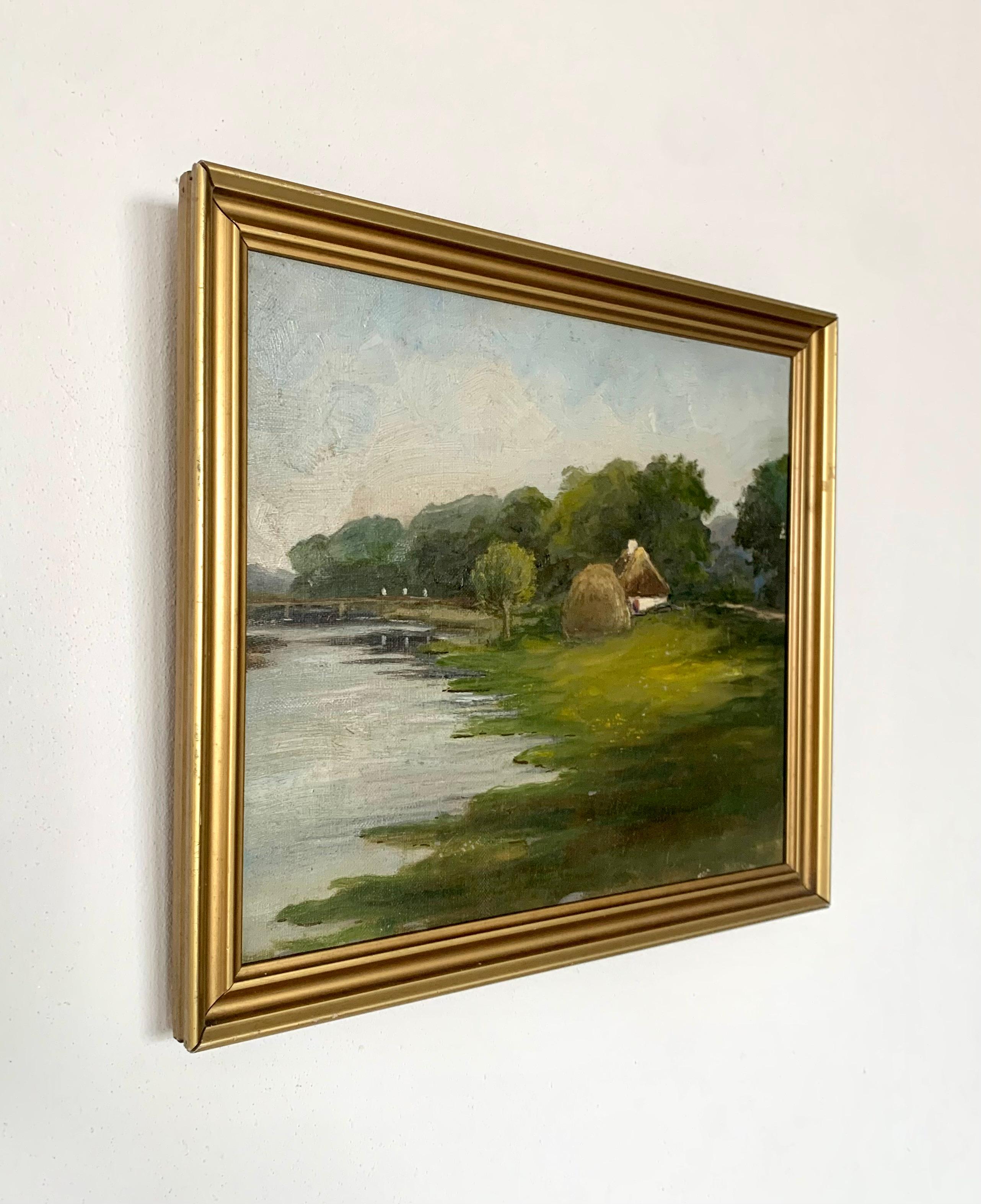Romantic Antique pastoral oil painting of small house in a green riverside landscape For Sale
