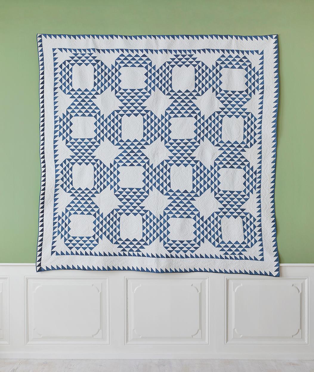 USA, late 19th century

“Ocean Waves” antique quilt.

Offered for sale is an exquisitely stitched variation of an Ocean Waves quilt done in indigo calico on a solid white ground. The white open fields are finely quilted with wreaths. The outer