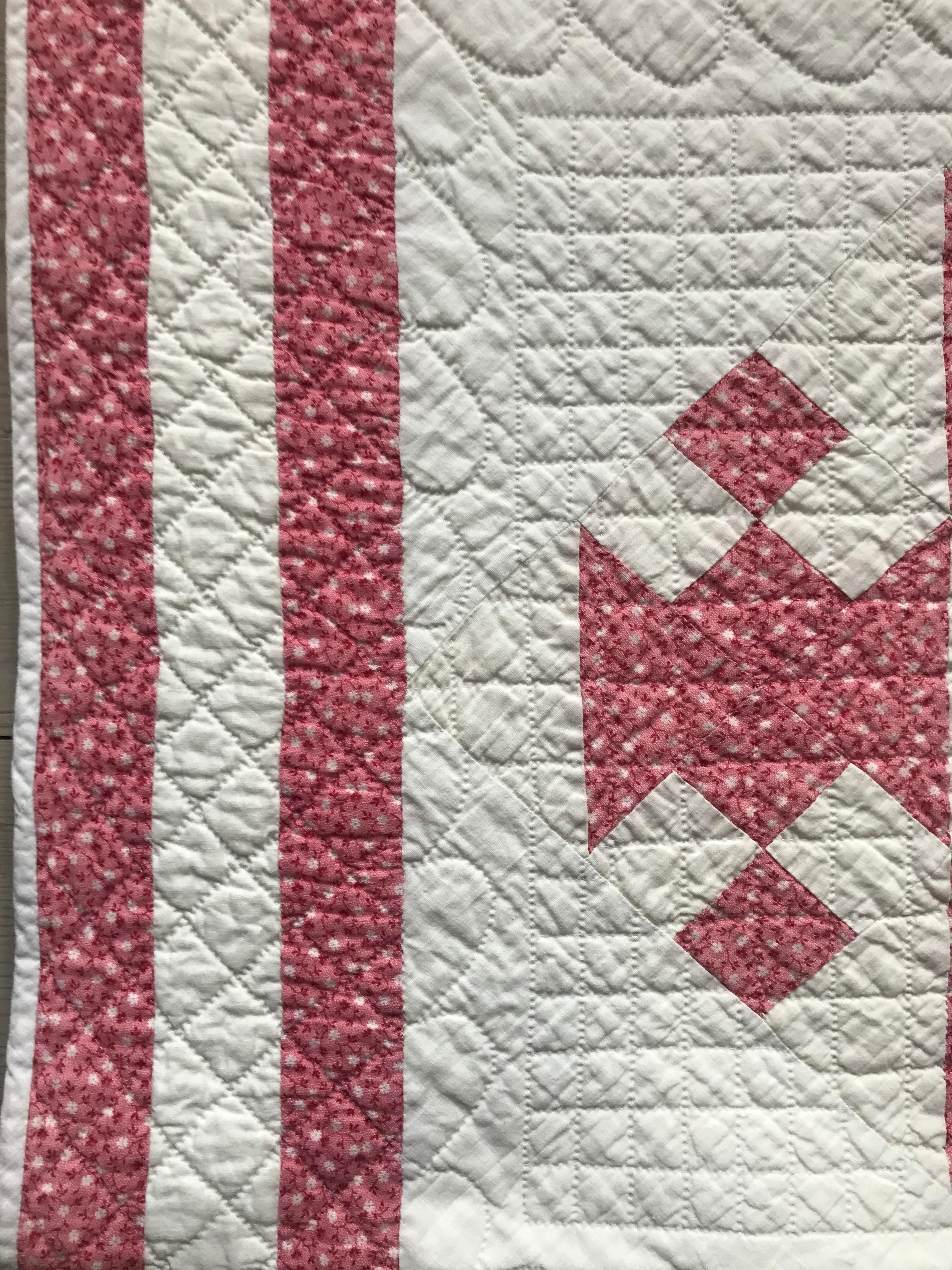 Lovely antique pink and white Jacob's ladder quilt.