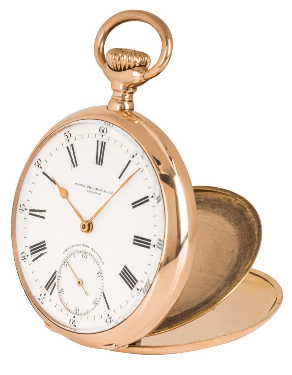 A Patek Philippe 18ct rose gold, keyless lever Gondolo open face pocket watch, 1910.

Dial: A perfect white enamel Roman dial signed Patek Philippe & Co Genève with sub second dial signed above Chronometro Gondolo with gold spade hands covered by a