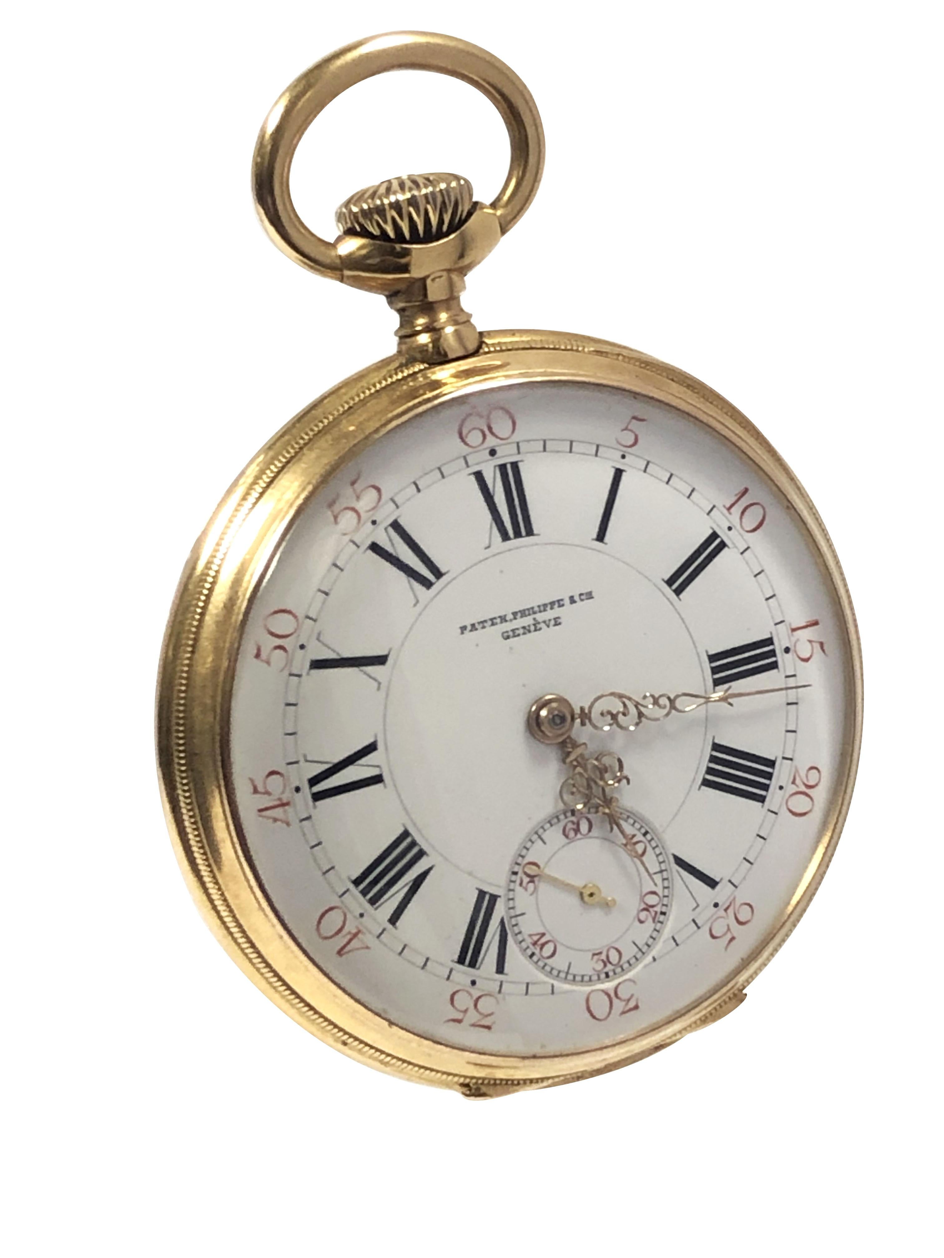 Circa 1900 Patek Philippe Pocket Watch, 46 M.M. 18k Yellow Gold 3 Piece case with Hinged Front and Back covers and an inside Dust cover, Jeweled Nickle Lever stem set and wound movement. Porcelain dial with Black Roman numerals, Red outer Track and