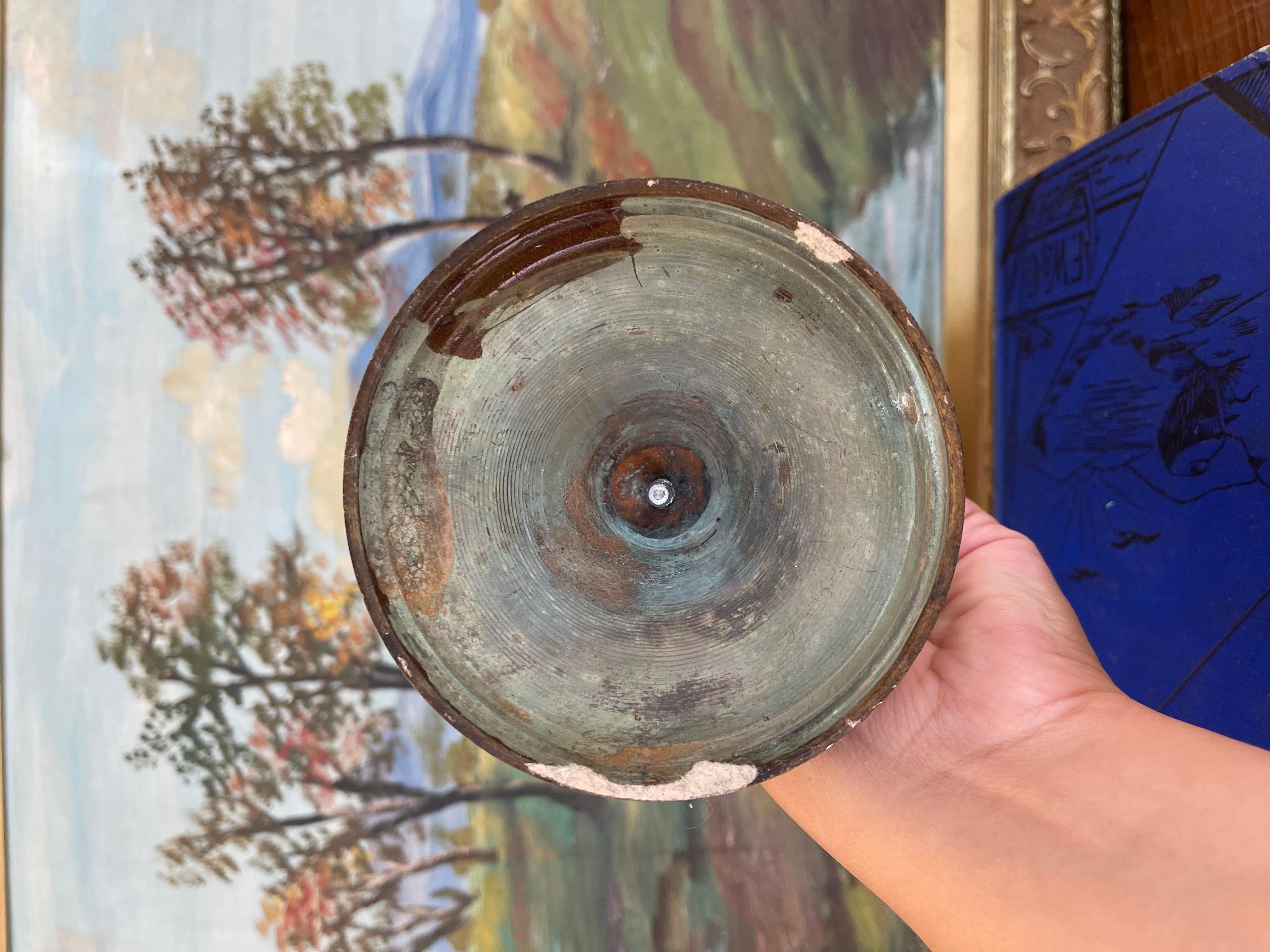 Antique Patinated Brass Toned Candlestick Holder with Wax Residue, 20th Century For Sale 1