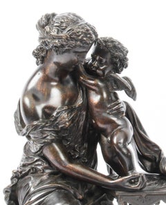 Bronzo antico patinato di Emile Herbert Donna con cherubino, XIX secolo