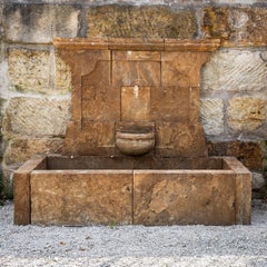 Antique-patinated Wall fountain, 21st Century