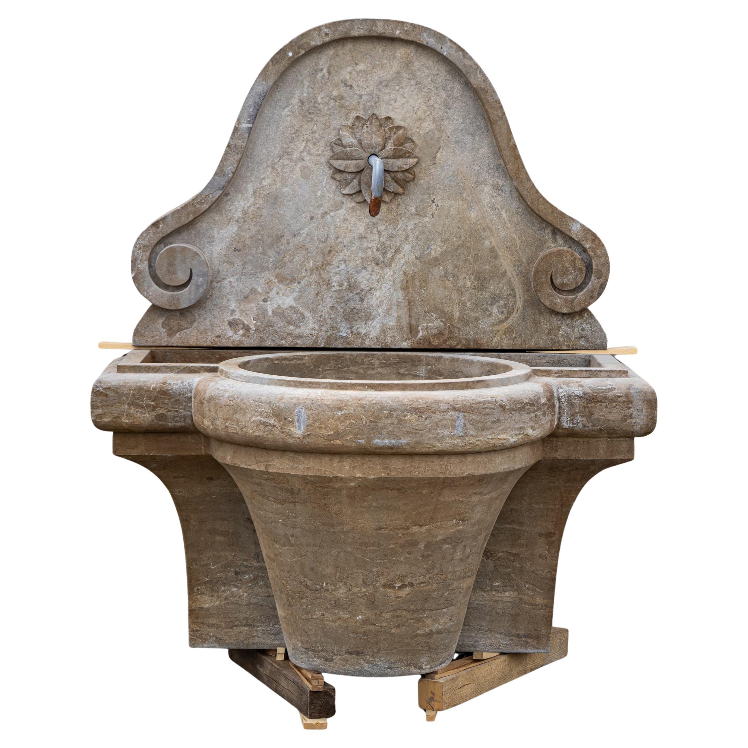 Antique-patinated Wall fountain, 21st Century