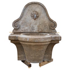 Antique-patinated Wall fountain, 21st Century
