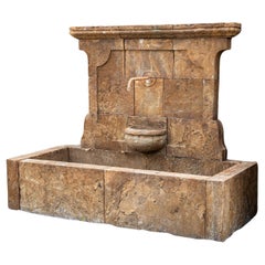 Antique-patinated Wall fountain, 21st Century