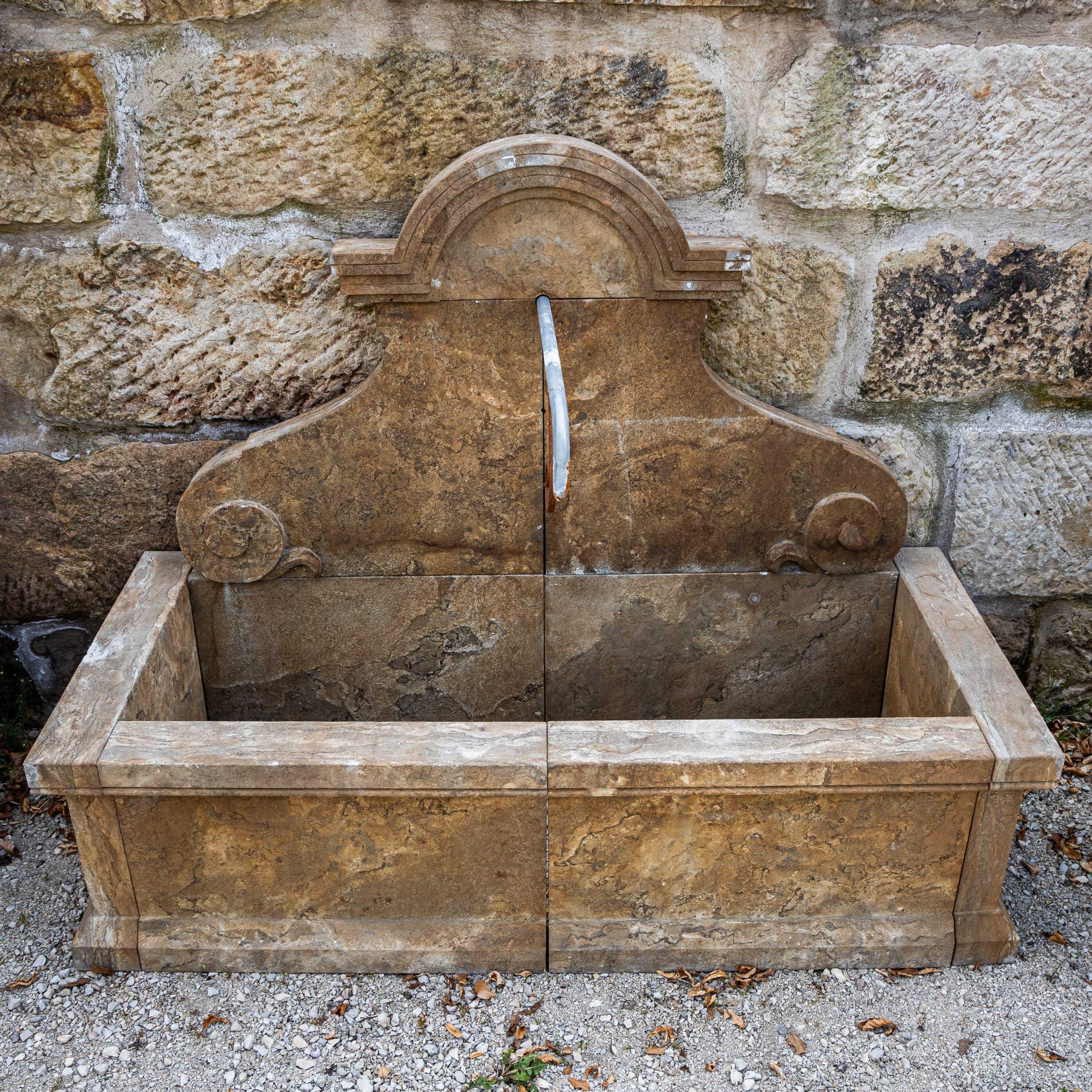 Stone Antique-patinated Wall fountain in Renaissance Style, 21st Century For Sale