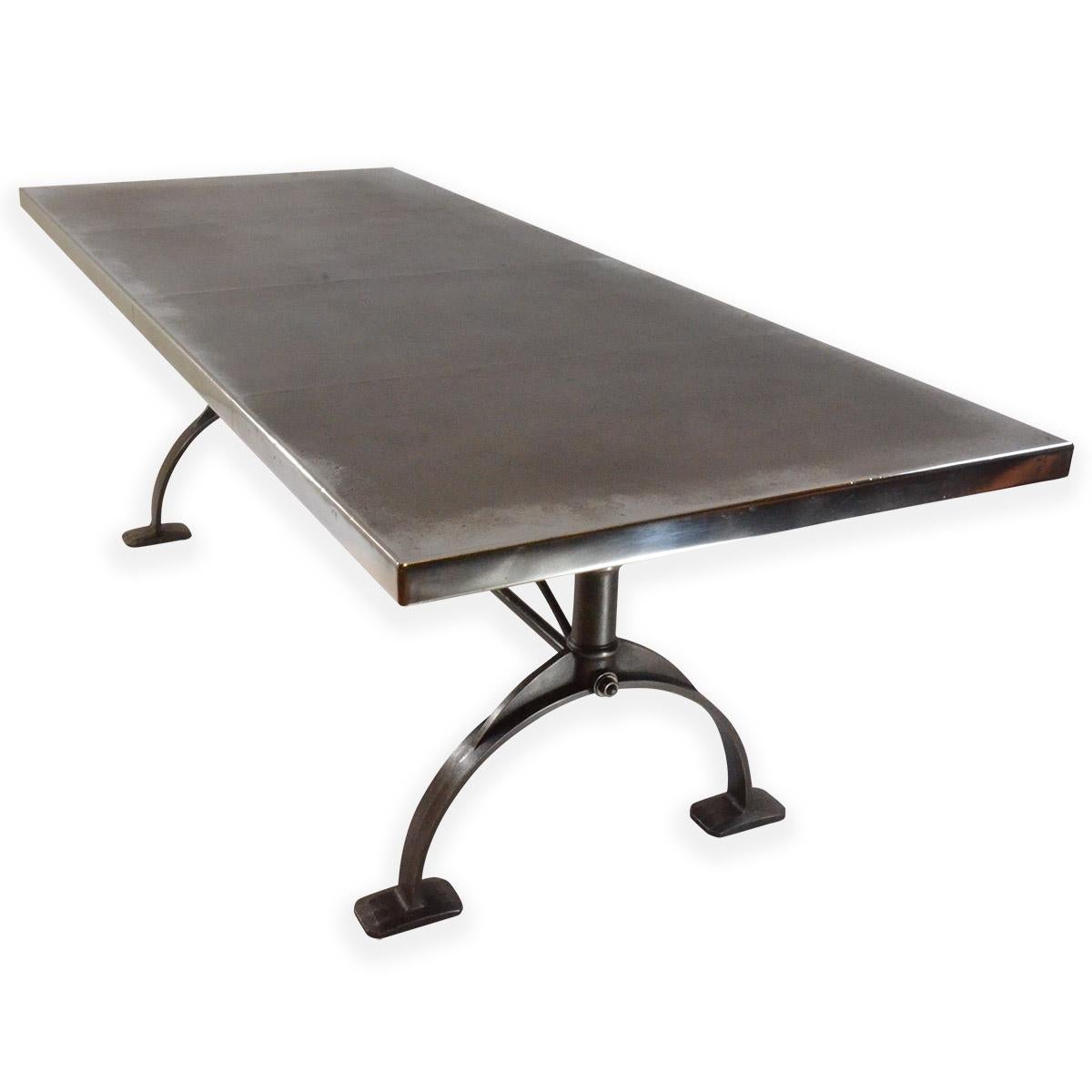 An Andrew Nebbett Designs standard sized zinc top dining table with square profile edges, on unique cast iron legs. This dining table (or kitchen table) is tailor-made to order and is handmade, coloured, patinated and finished in our English