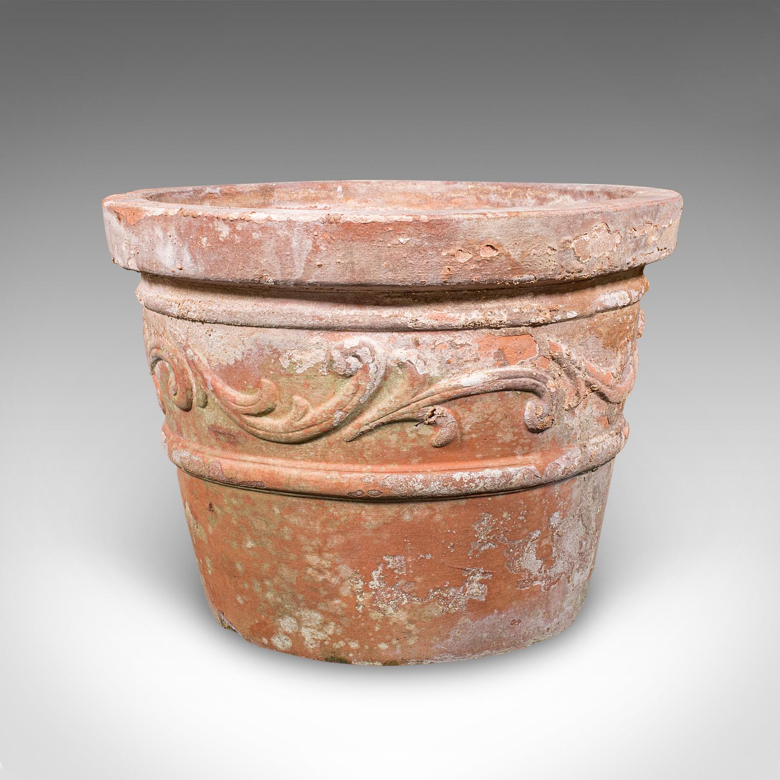 This is an antique patio planter. An English, terracotta ornamental tree or jardiniere pot, dating to the late Victorian period, circa 1900. A charming veranda or patio planter presenting a beautifully weathered appearance and timeless decorative