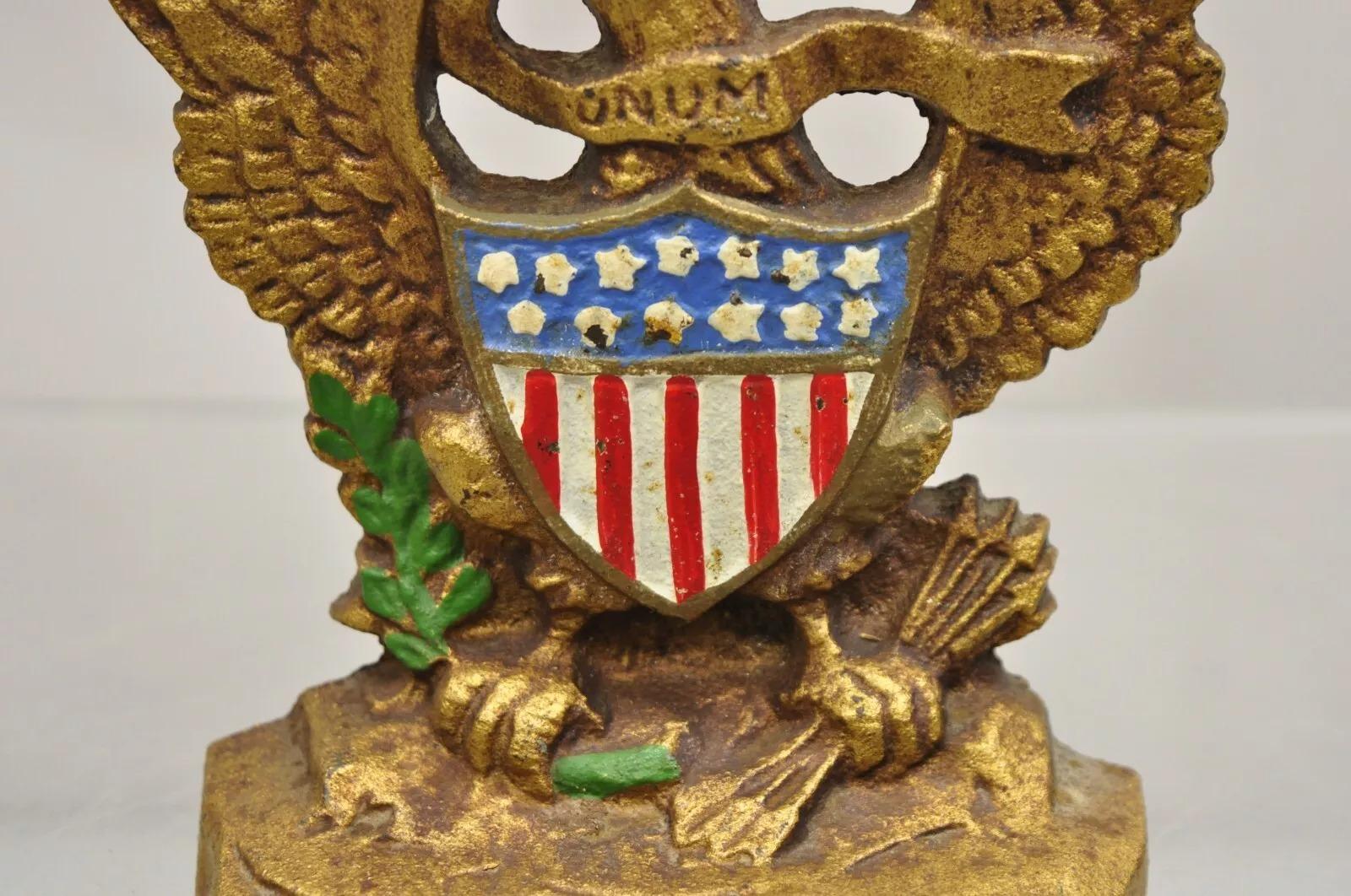 Antique Patriotic Cast Iron Figural Gold American Flag & Eagle Painted Door Stop In Good Condition For Sale In Philadelphia, PA