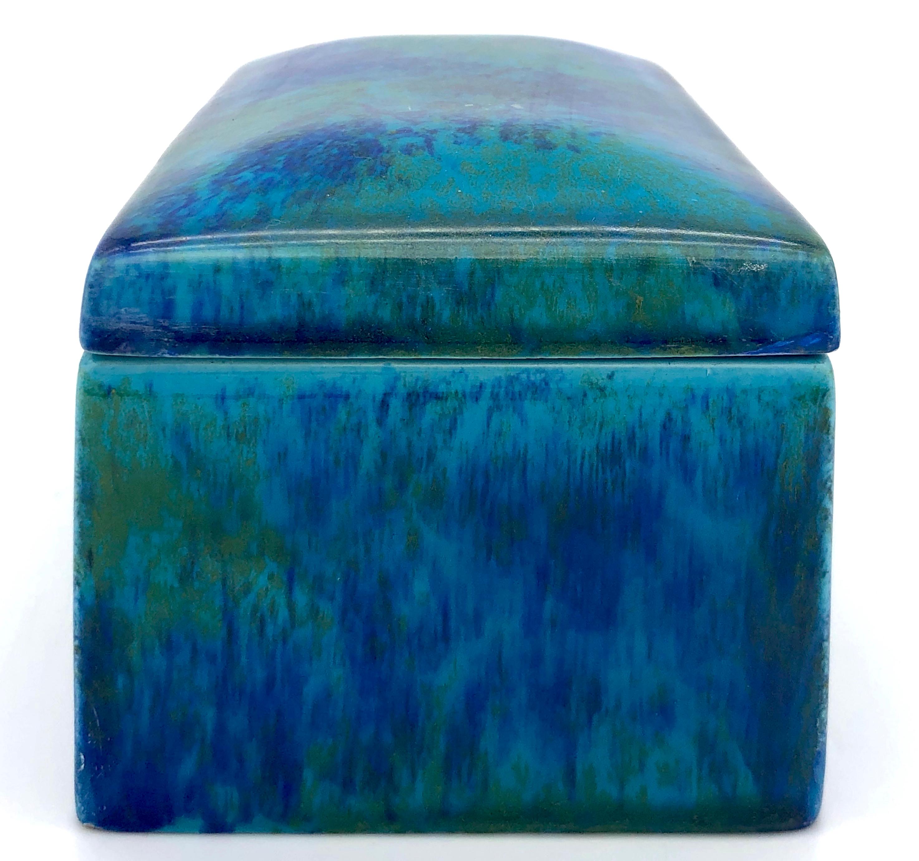 This fine Sèvres ceramic box is marked PM Sèvres for Paul Jean Milet. It has been glazed in the most marvellous colours reminiscent of a Monet's water lillies.