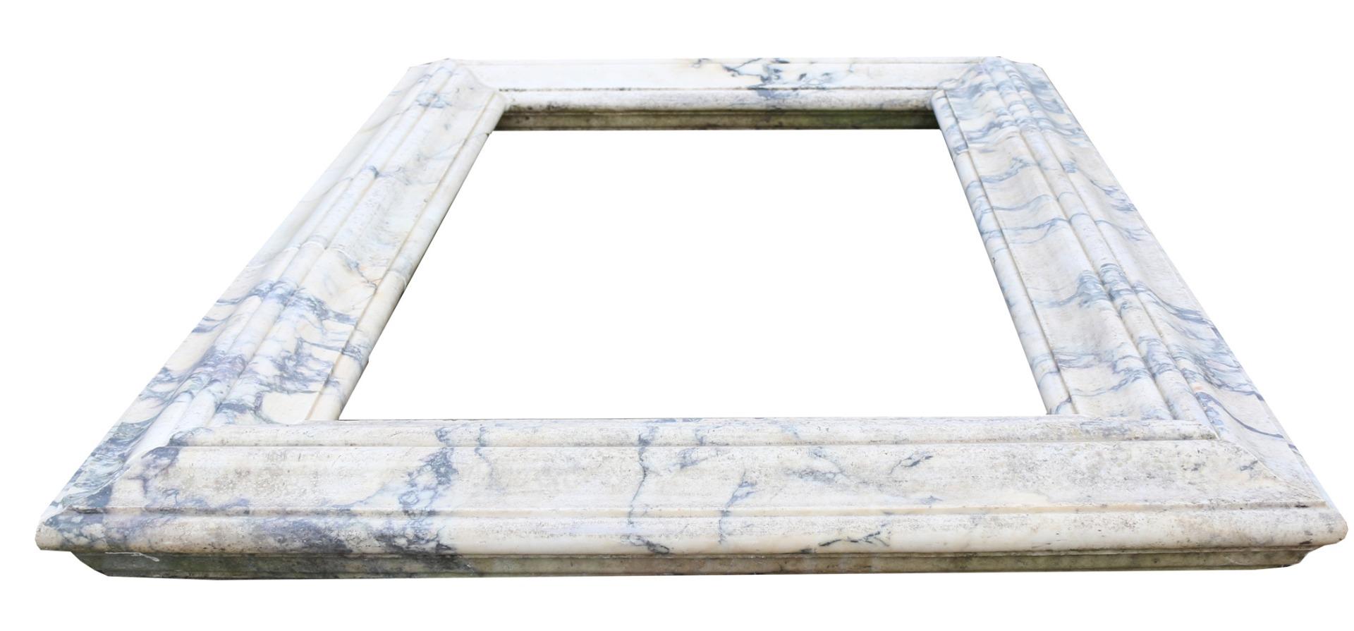A simple, profiled pool surround, made from Italian Pavonazzo Marble.

External size 207 cm x 140.5 cm

Internal size 152 cm x 86 cm

Profile H 14 cm x W 27 cm.