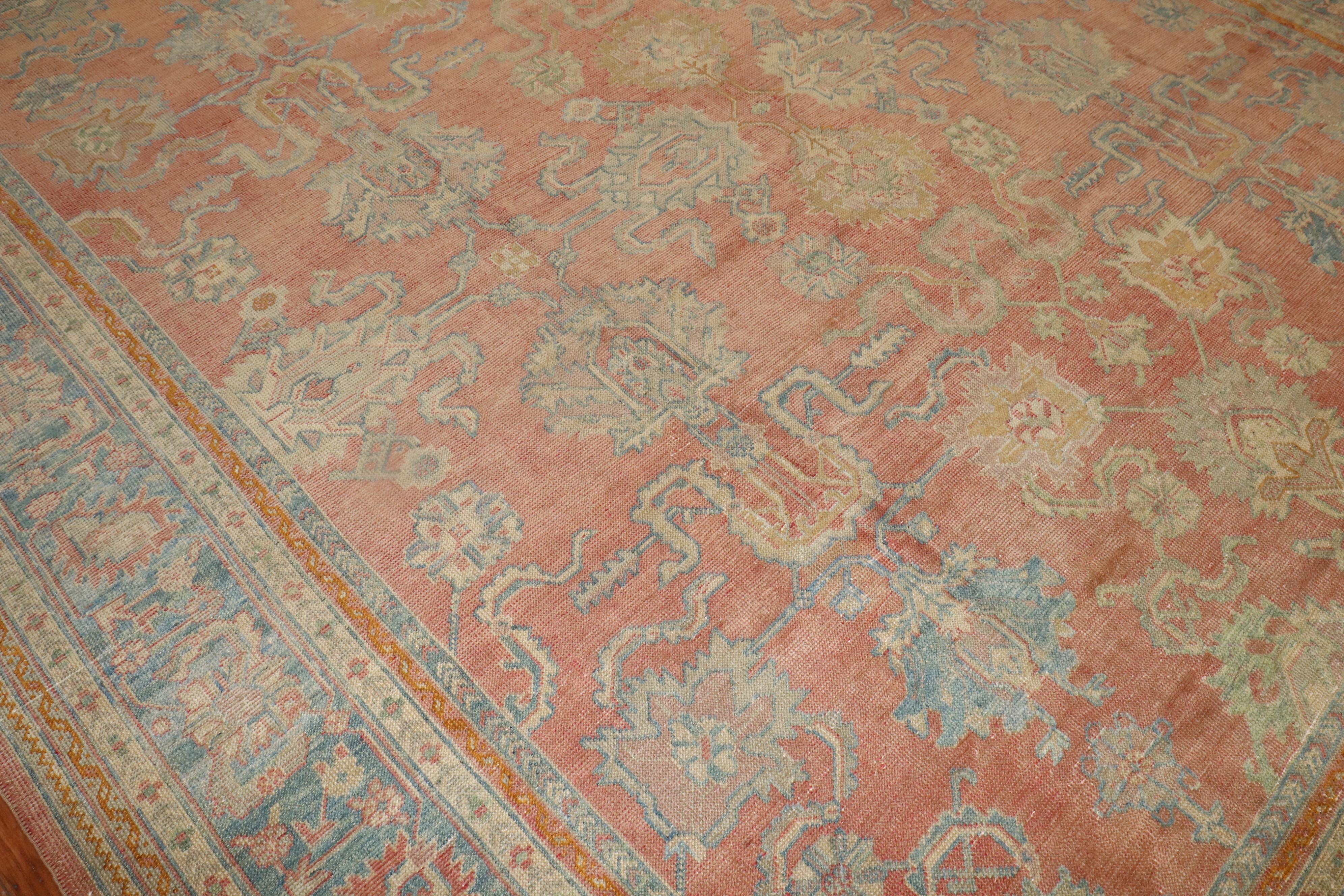 20th Century Antique Peach Oushak Rug For Sale