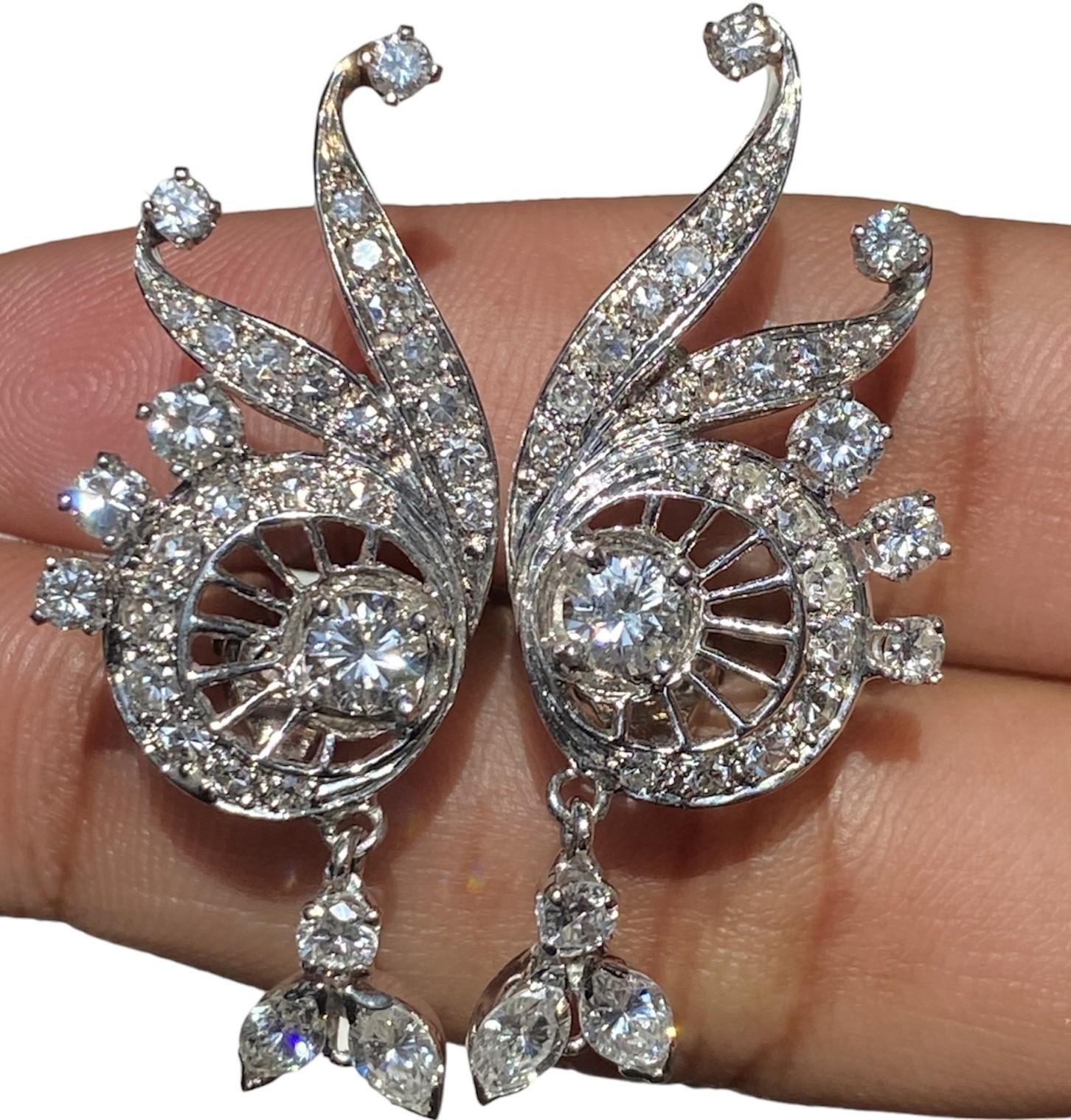 Discover the allure of our Antique Peacock Design Earrings, a masterpiece of vintage beauty. These exquisite earrings feature a captivating peacock design and boast a total carat weight (TCW) of 2.00. Crafted in 14K white gold, they exude elegance