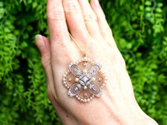 Antique Pearl and 0.77 Carat Diamond, 9k Rose Gold Pendant / Brooch Circa 1910