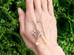 Antique Pearl and 1.18 Carat Diamond, 14k Rose Gold Pendant Circa 1930