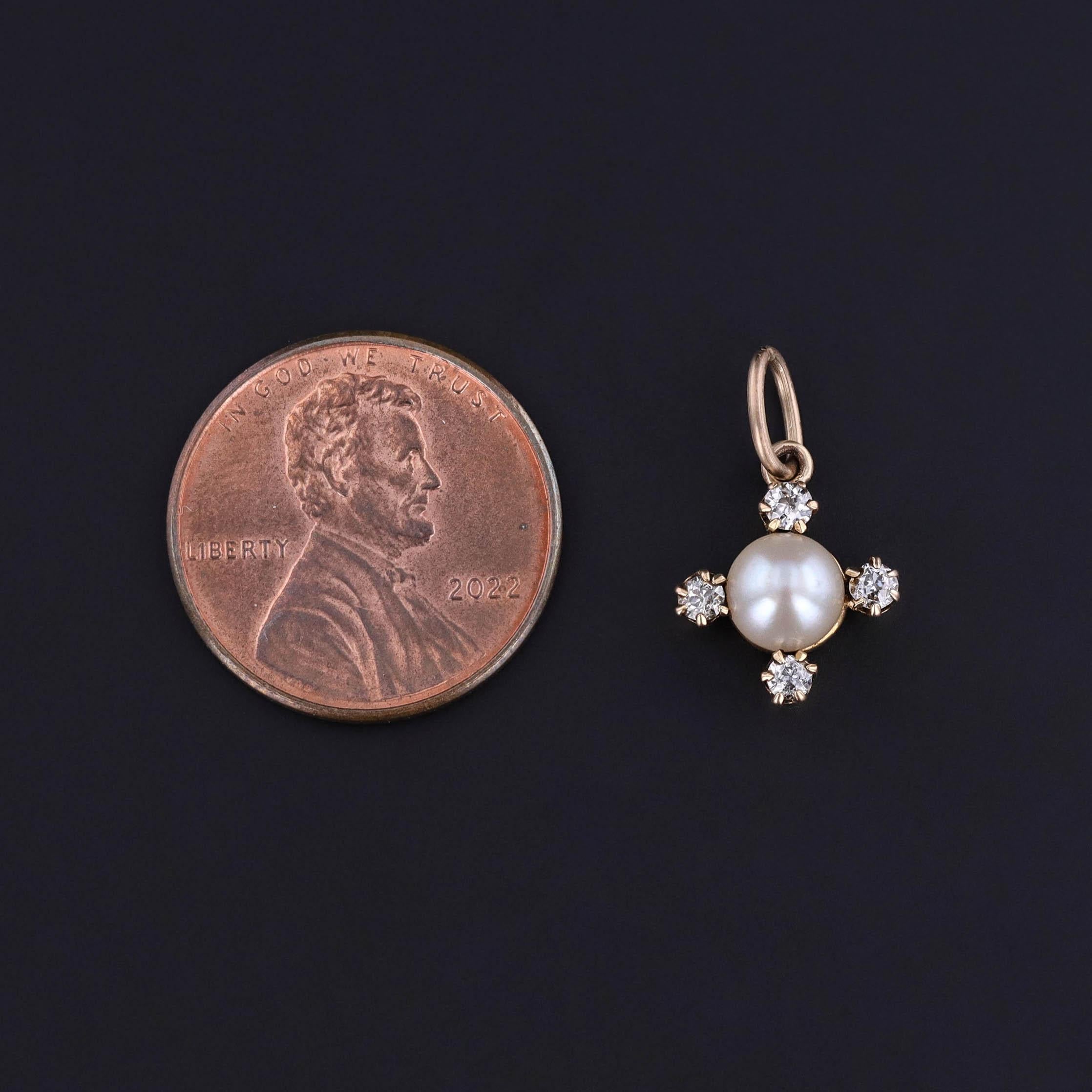 Once gracing the lapel as a late 19th-century stickpin (circa 1890–1900), this elegant jewel has been masterfully transformed into a versatile charm. At its heart rests a lustrous pearl, accented with four old mine cut diamonds, all set in solid 18k