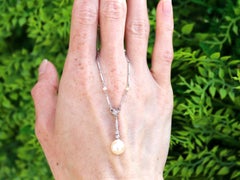 Antique Pearl And Diamond Pendant in Platinum