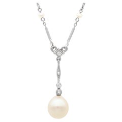 Antique Pearl And Diamond Pendant in Platinum