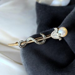 Antique Victorian Pearl and Diamond Flower Head, Snake Brooch. Circa 1890–1910