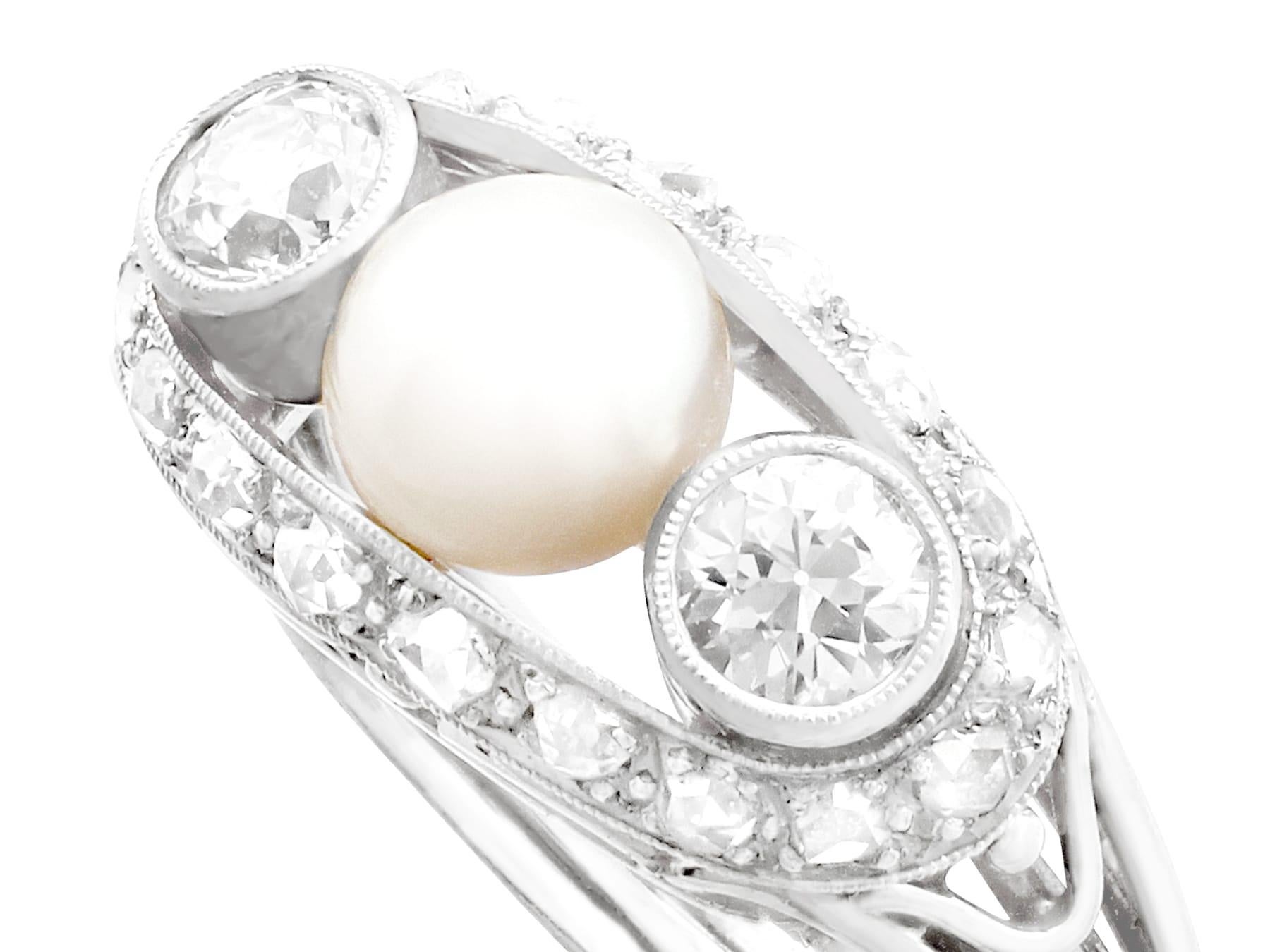 A stunning, fine and impressive antique pearl and 0.78 carat diamond, 14 karat white gold cocktail ring; part of our antique jewelry and estate jewelry collections.

This stunning antique pearl and diamond ring has been crafted in 14k white