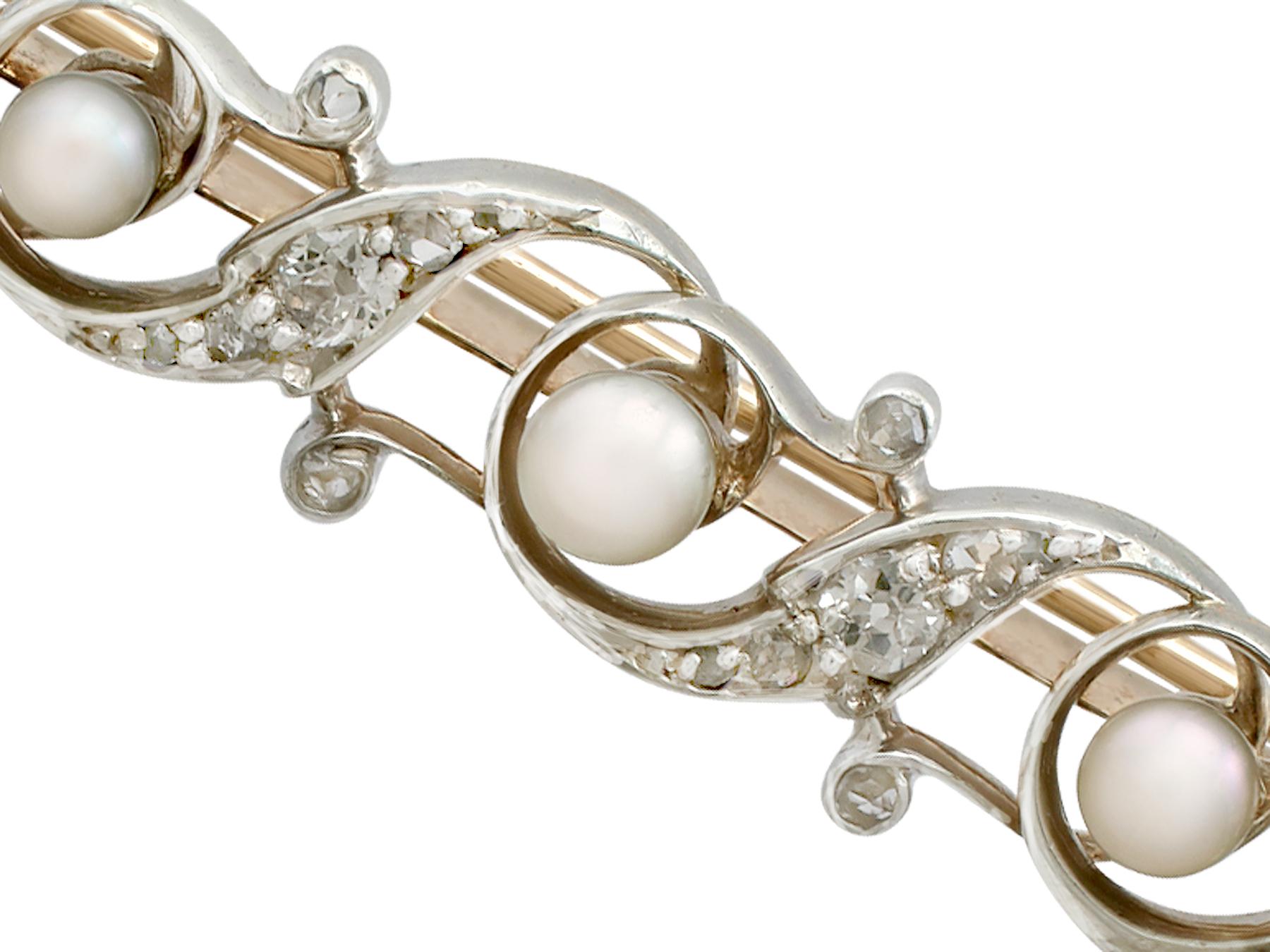 An impressive antique pearl and 0.75 carat diamond, 9 karat yellow gold and silver set bar brooch; part of our diverse antique jewelry and estate jewelry collections.

This fine and impressive antique pearl brooch has been crafted in 9k yellow gold