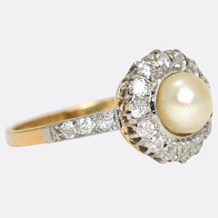 Bague ancienne en or 18 carats ornée d'un bouquet de perles et de diamants, vers 1915