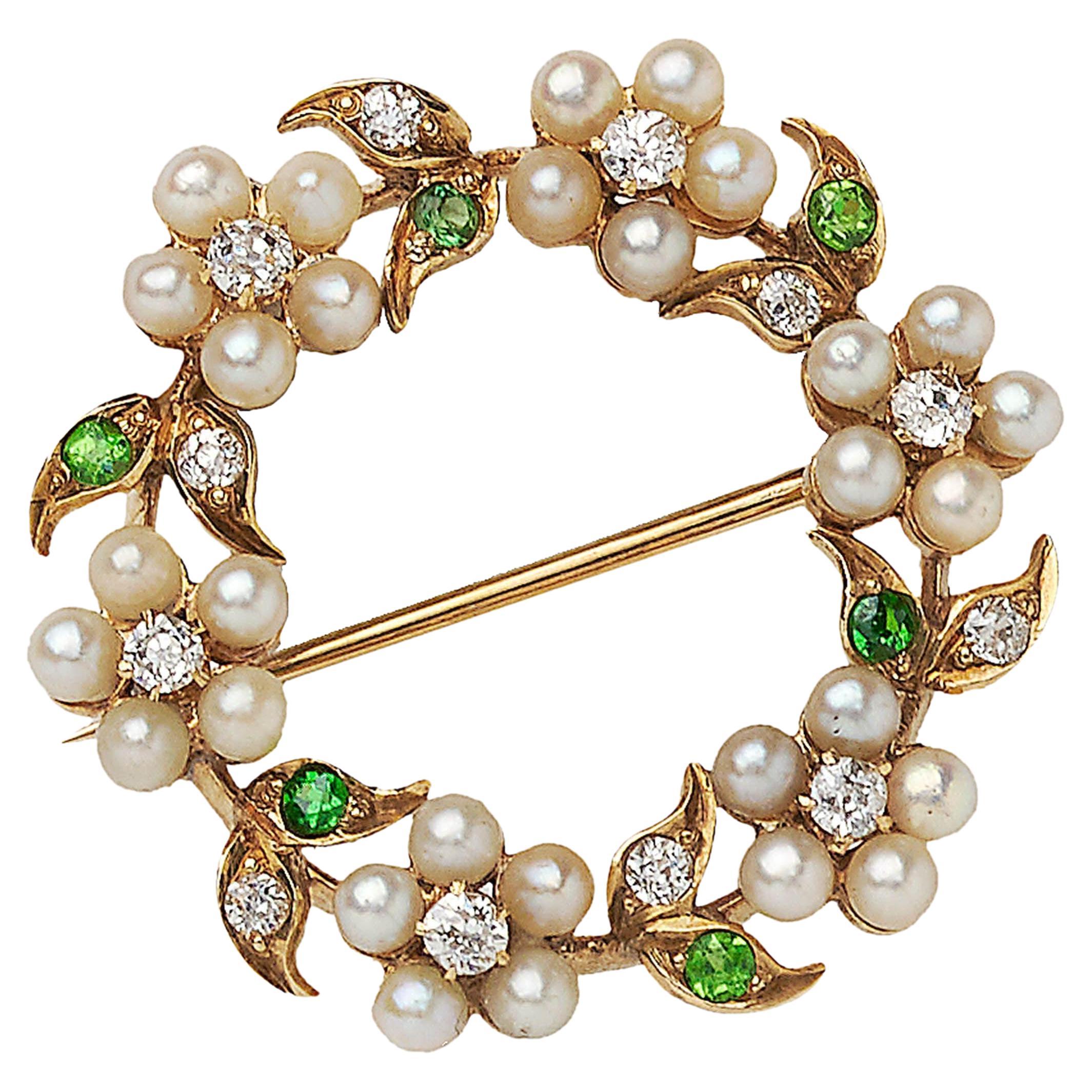 Antique Pearl, Diamond, Demantoid Garnet and Gold Wreath Brooch, circa 1920 For Sale