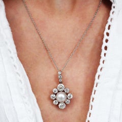 Antique Pearl, Diamond, Platinum And Gold Cluster Pendant, Circa 1910