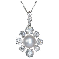 Antico ciondolo a grappolo con perle, diamanti, platino e oro, circa 1910