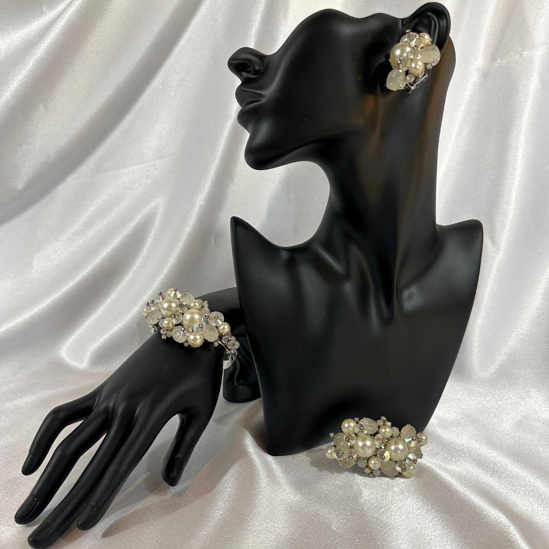 Inside Bracelet Diameter: 2.10″

Earring Size: 1.08″ x 1.56″

Brooch Size: 1.55″ x  2.60″

Bin Code: B2 / P3

Embrace the allure of the past with this exquisite Antique Pearl, Glass, and Rhinestone Alice Caviness Jewelry Set. This set includes a