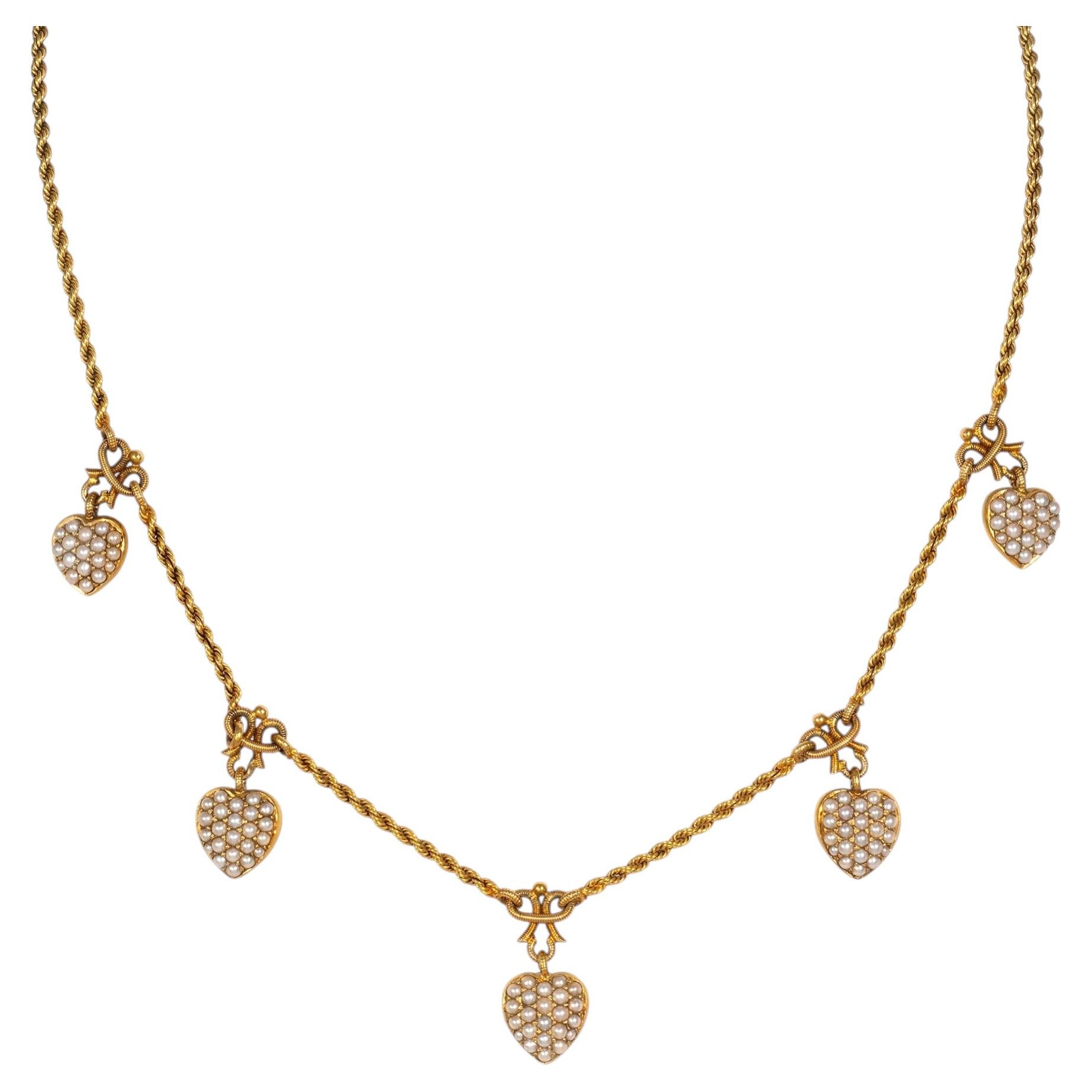 Collar antiguo con colgante de corazón de perla