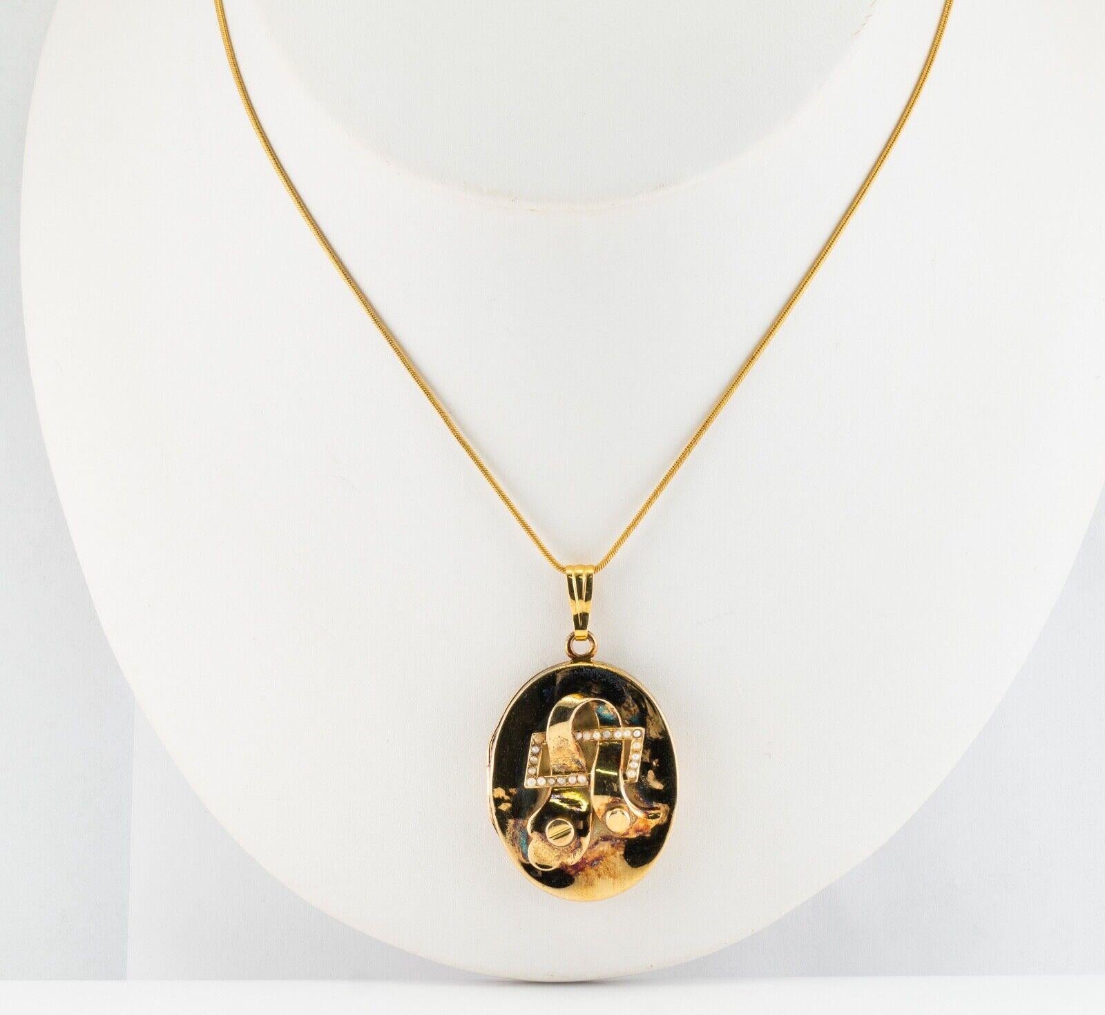 Ciondolo antico con perla ovale in oro 14K 

Questo splendido medaglione/ciondolo vintage è finemente realizzato in oro giallo massiccio 14K (accuratamente testato e garantito) e incastonato con perle naturali d'acqua dolce da 0,8 mm ciascuna. 
Il