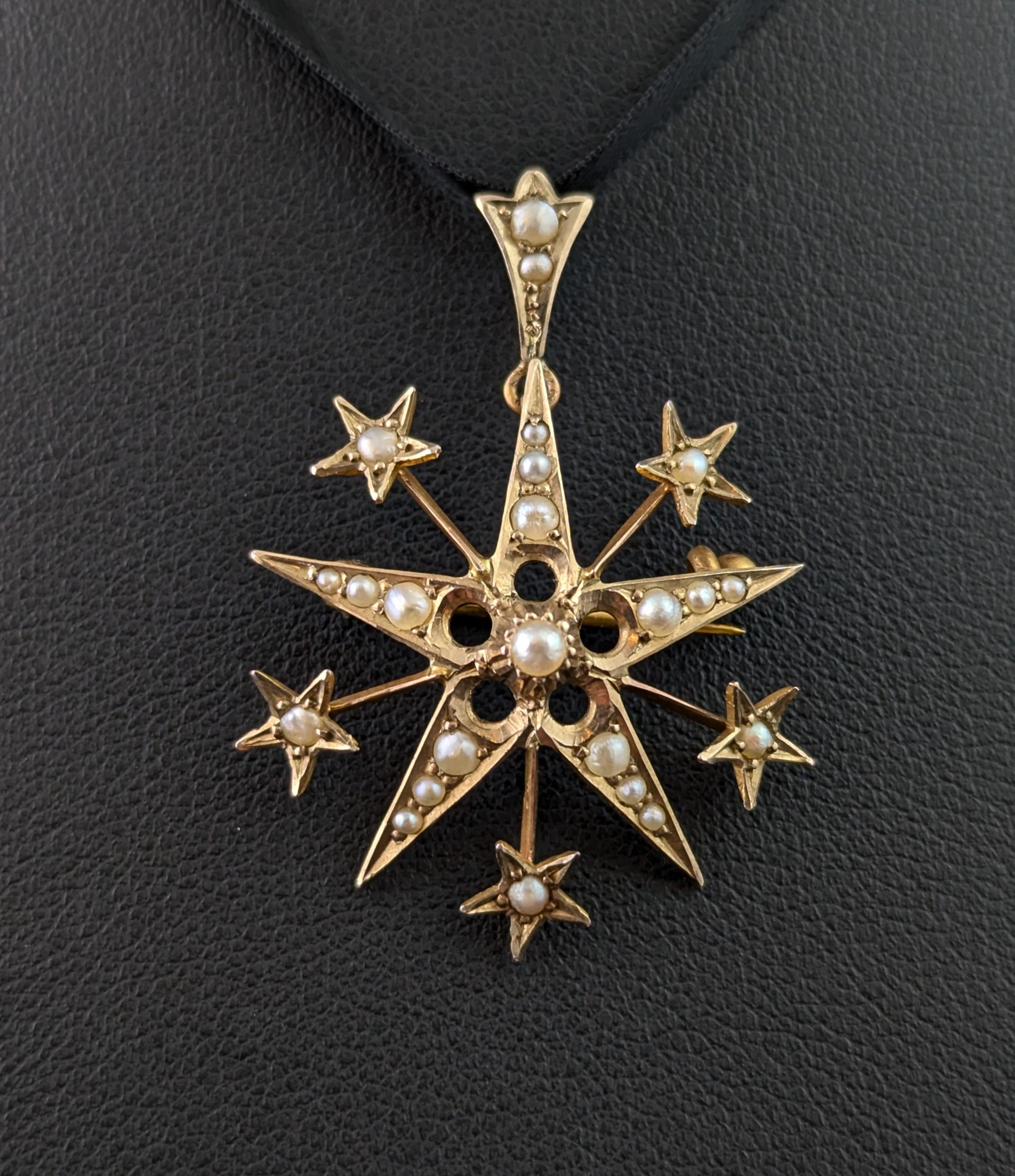 This fabulous antique star pendant brooch is both bold yet delicate.

It is crafted in 9ct yellow gold with a star design, set with creamy seed pearls, it has a further Starburst design with each little burst decorated with a tiny star.

The pendant