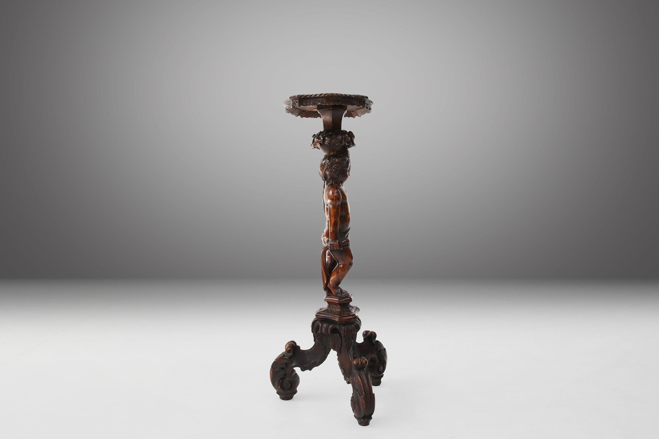This table is made of solid wood, which means it has a sturdy and durable construction. The wood has a beautiful patina, which is a sign of the age and quality of the material. The table dates from around 1850, which makes it an antique and valuable