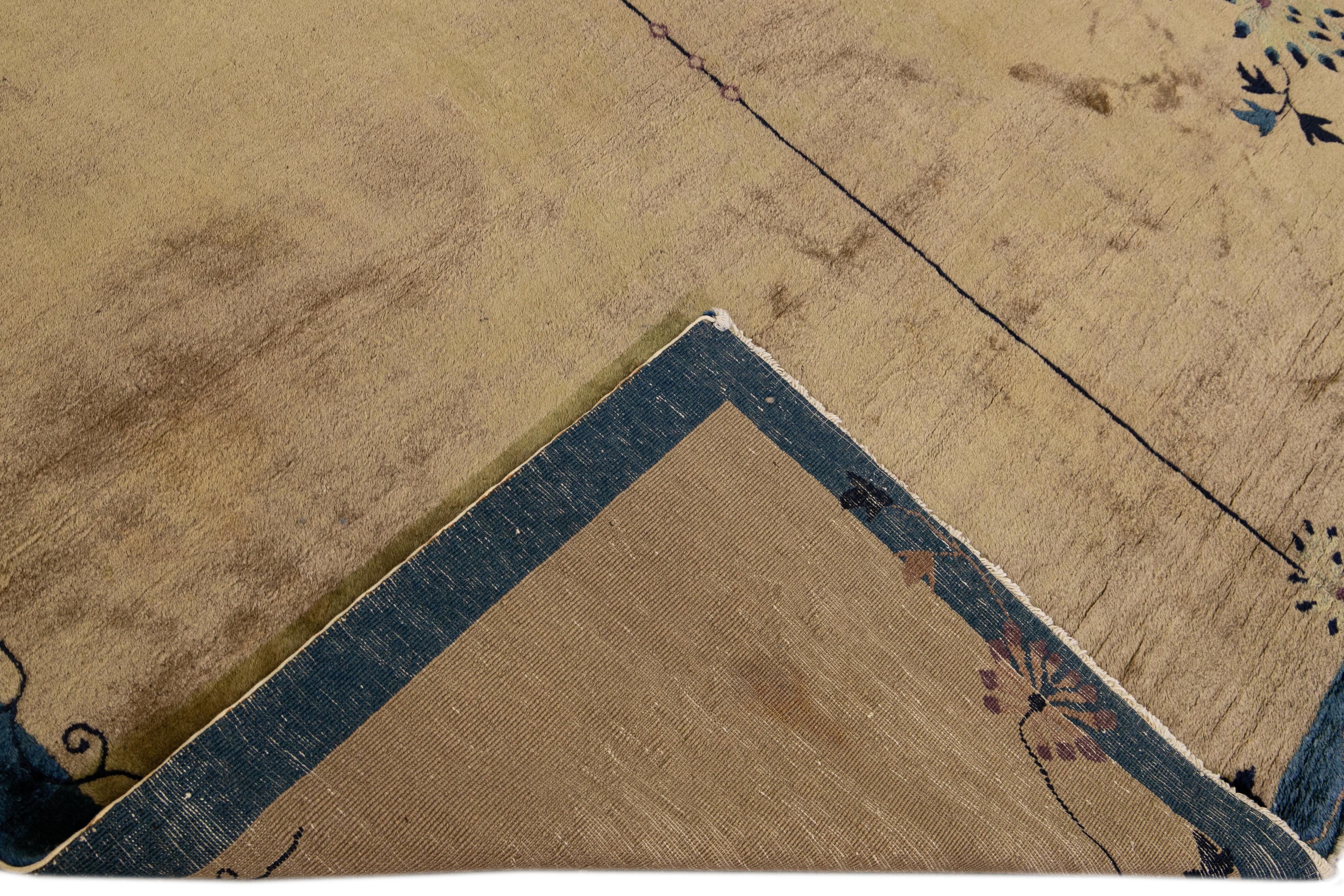 Beautiful antique Peking Chinese hand-knotted wool rug with a brown field. This Chinese rug has a blue frame and multi-color accents in a gorgeous all-over Chinese floral design. 

This rug measures: 7'7